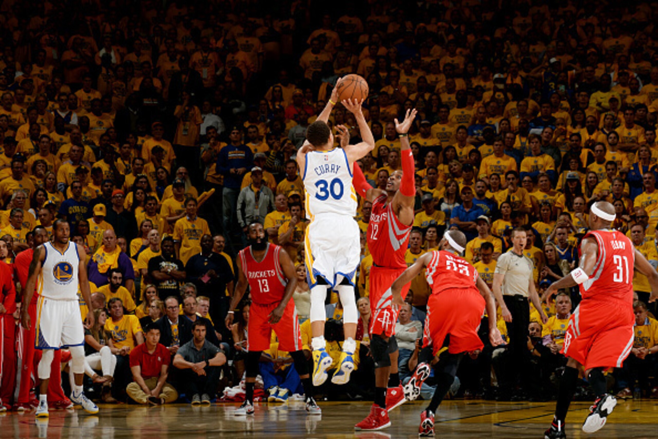 OAKLAND, CA - MAY 27: Stephen Curry #30 of the Golden State Warriors shoots against Dwight Howard #12 of the Houston Rockets in Game Five of the Western Conference Finals of the 2015 NBA Playoffs on May 27, 2015 at Oracle Arena in Oakland, California. NOT