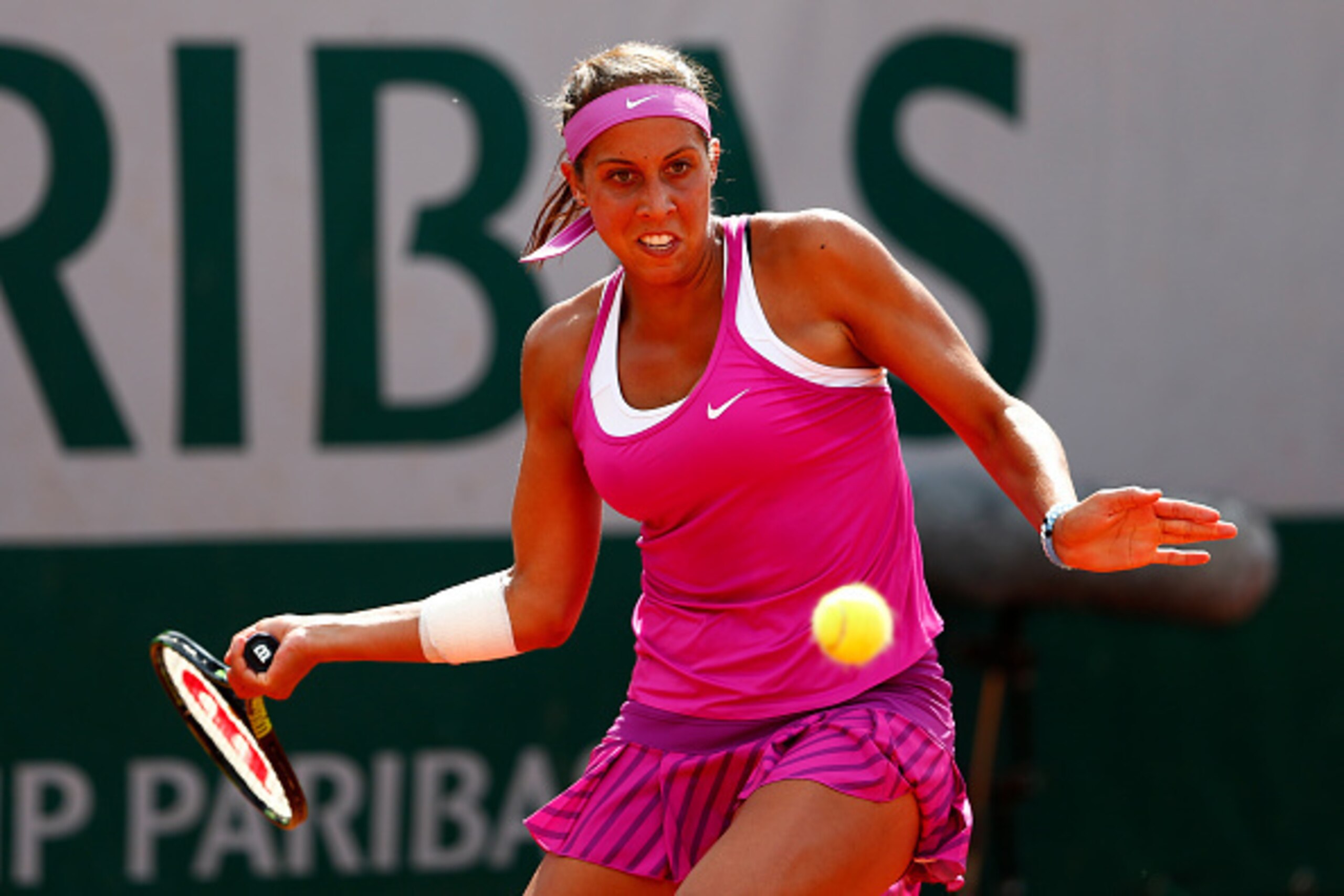 PARIS, FRANCE - MAY 28:  Madison Keys of the United States plays a forehand in her Women's Singles match against Belinda Bencic of Switzerland on day five of the 2015 French Open at Roland Garros on May 28, 2015 in Paris, France.  (Photo by Julian Finney/