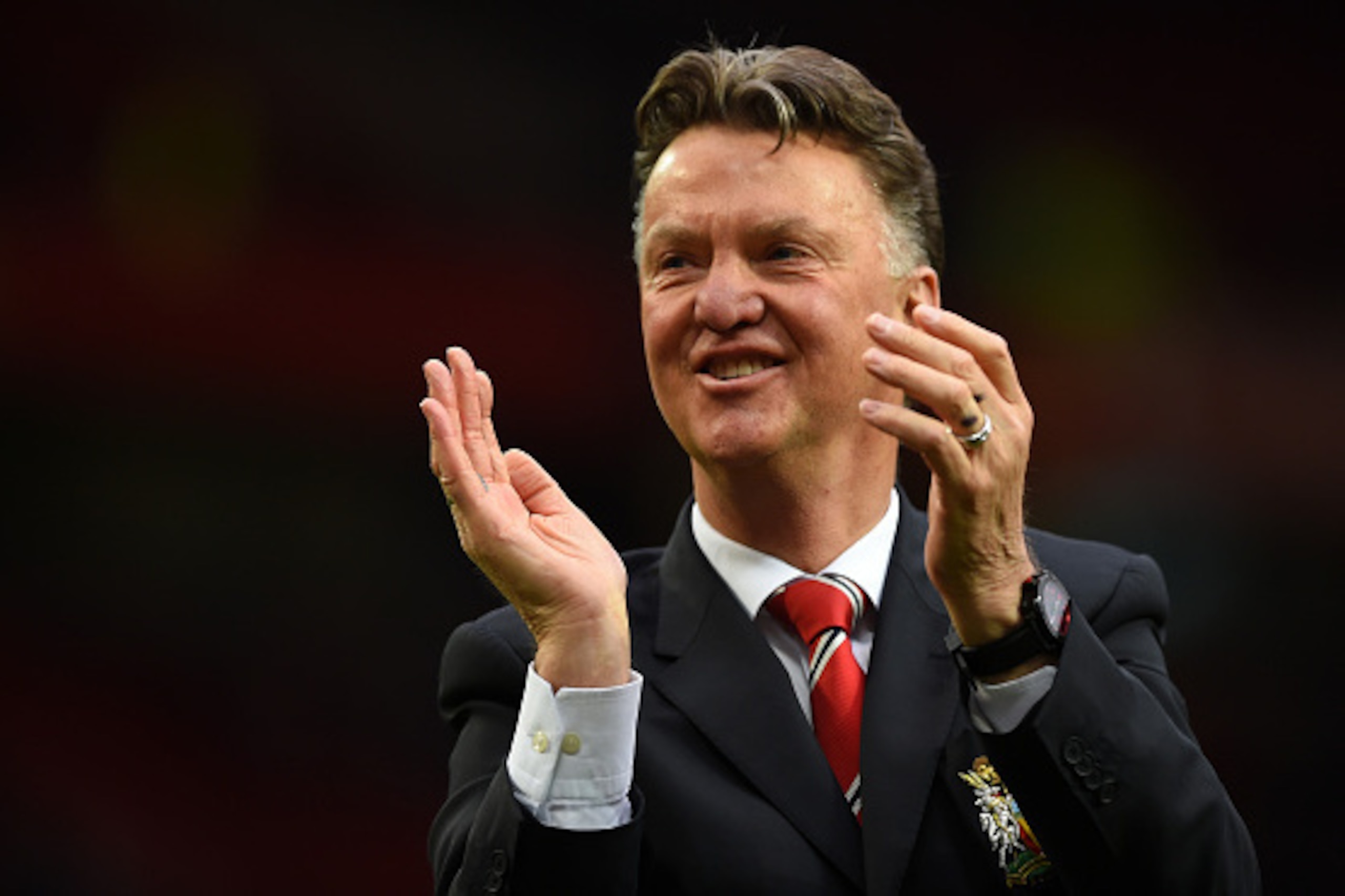 MANCHESTER, ENGLAND - MAY 17:  Louis van Gaal manager of Manchester United applauds the crowd after the Barclays Premier League match between Manchester United and Arsenal at Old Trafford on May 17, 2015 in Manchester, England.  (Photo by Shaun Botterill/