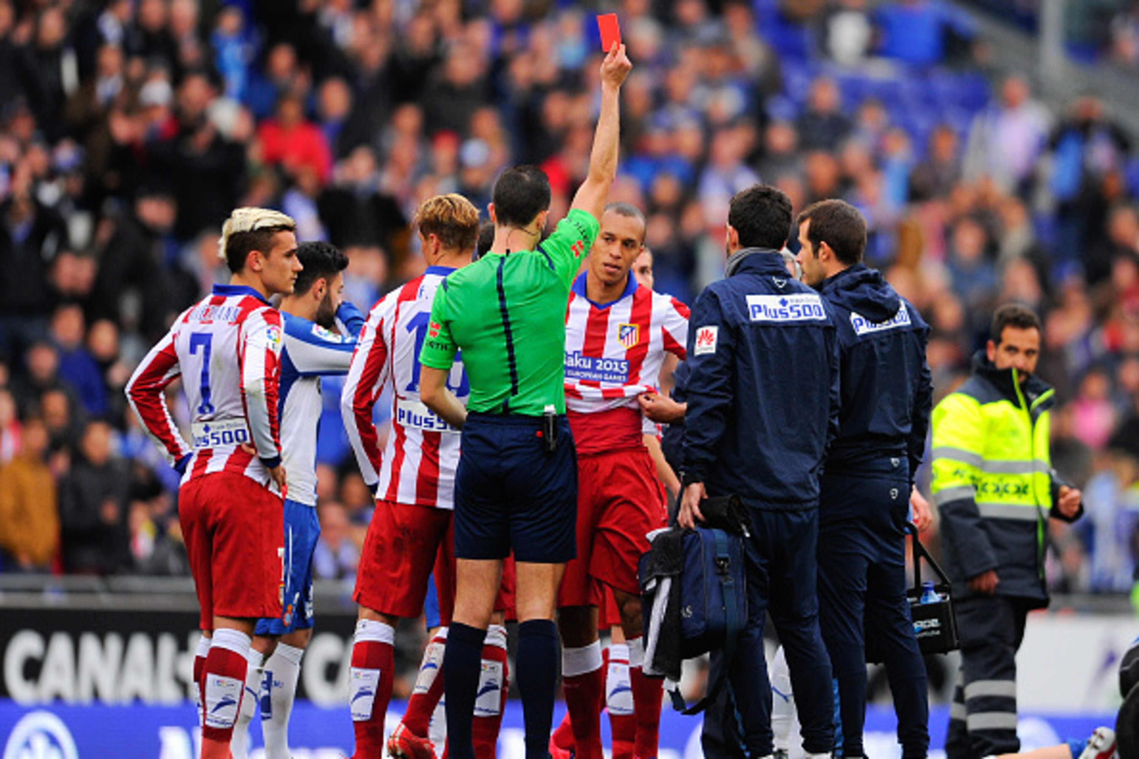 BARCELONA, SPAIN - MARCH 14:  Joao Miranda (C) of Atletico de Madrid is shown a red card for a challenge on Abraham Gonzalez of RCD Espanyol during the La Liga match between RCD Espanyol and Club Atletico de Madrid at Power 8 Stadium on March 14, 2015 in 