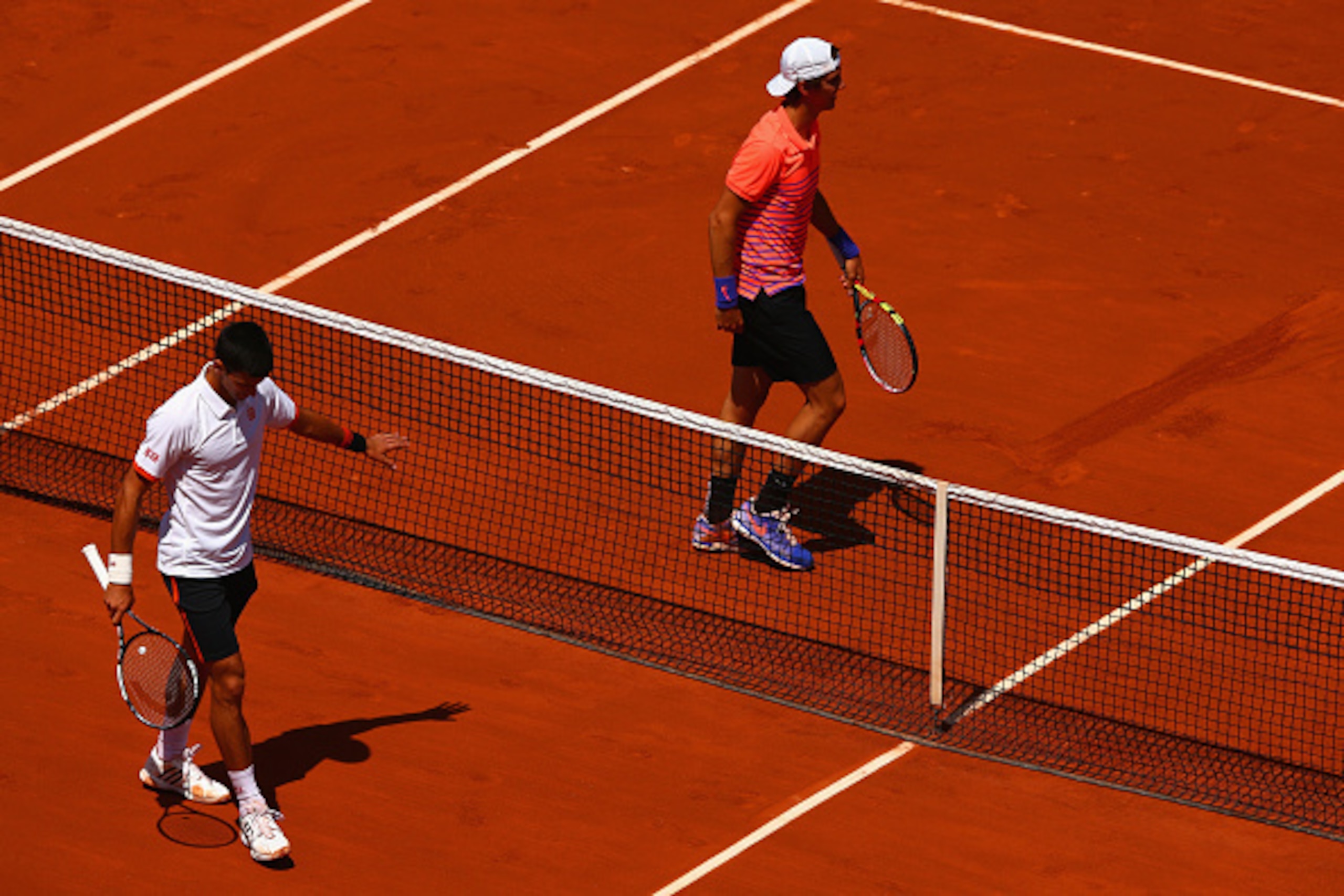 PARIS, FRANCE - MAY 30: Novak Djokovic of Serbia gestures to Thanasi Kokkinakis of Australia in their Men's Singles match on day seven of the 2015 French Open at Roland Garros on May 30, 2015 in Paris, France. (Photo by Clive Mason/Getty Images) PARIS, FRANCE - MAY 30: Novak Djokovic of Serbia gestures to Thanasi Kokkinakis of Australia in their Men's Singles match on day seven of the 2015 French Open at Roland Garros on May 30, 2015 in Paris, France. (Photo by Clive Mason/Getty Images)