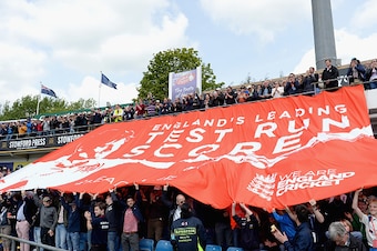LEEDS, ENGLAND - MAY 30:  Fans unveil a flag displaying a message to England captain Alastair Cook after he became England's leading test run scorer during day two of 2nd Investec Test match between England and New Zealand at Headingley on May 30, 2014 in