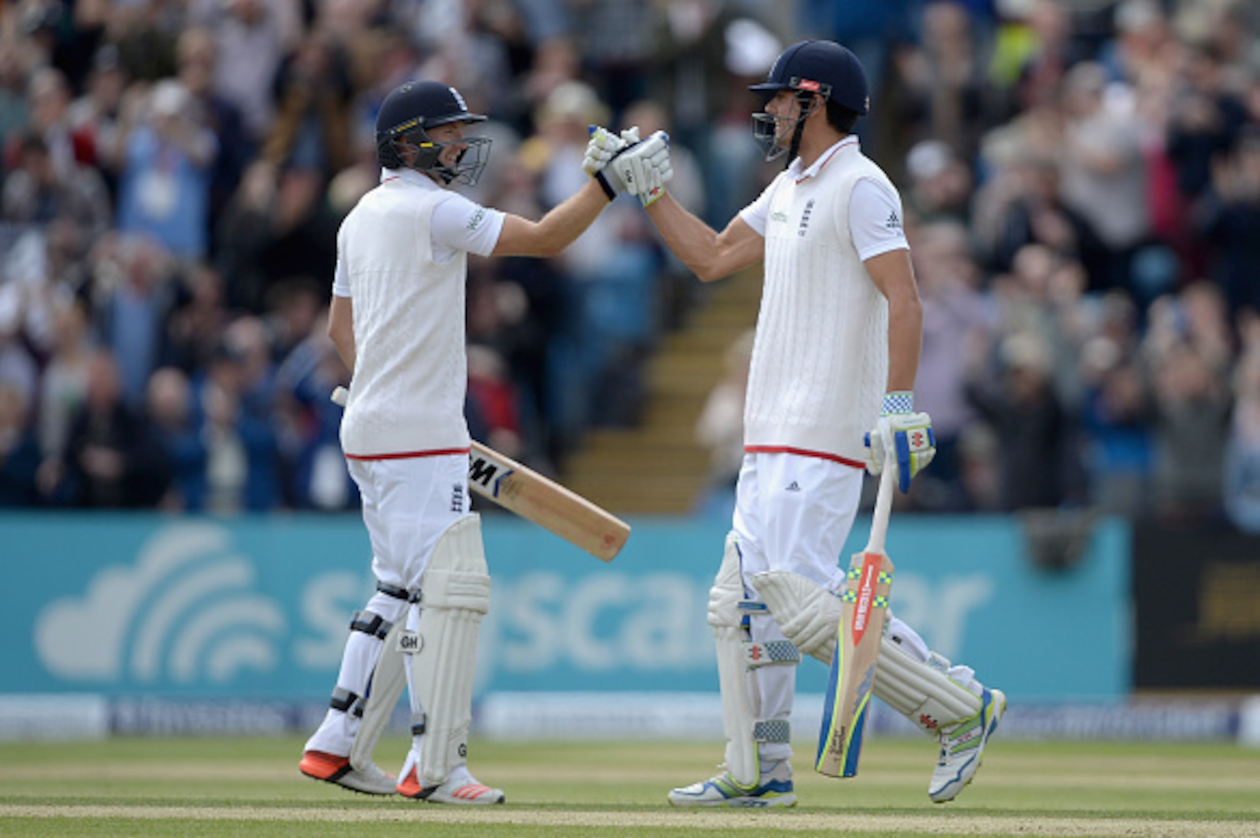LEEDS, ENGLAND - MAY 30: England captain Alastair Cook shakes hands with Adam Lyth after becoming England's leading test run scorer during day two of 2nd Investec Test match between England and New Zealand at Headingley on May 30, 2014 in Leeds, England. LEEDS, ENGLAND - MAY 30: England captain Alastair Cook shakes hands with Adam Lyth after becoming England's leading test run scorer during day two of 2nd Investec Test match between England and New Zealand at Headingley on May 30, 2014 in Leeds, England.
