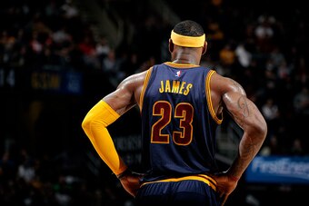 CLEVELAND, OH - FEBRUARY 26: LeBron James #23 of the Cleveland Cavaliers stands on the court during a game against the Golden State Warriors at The Quicken Loans Arena on February 26, 2015 in Cleveland, Ohio. NOTE TO USER: User expressly acknowledges and 