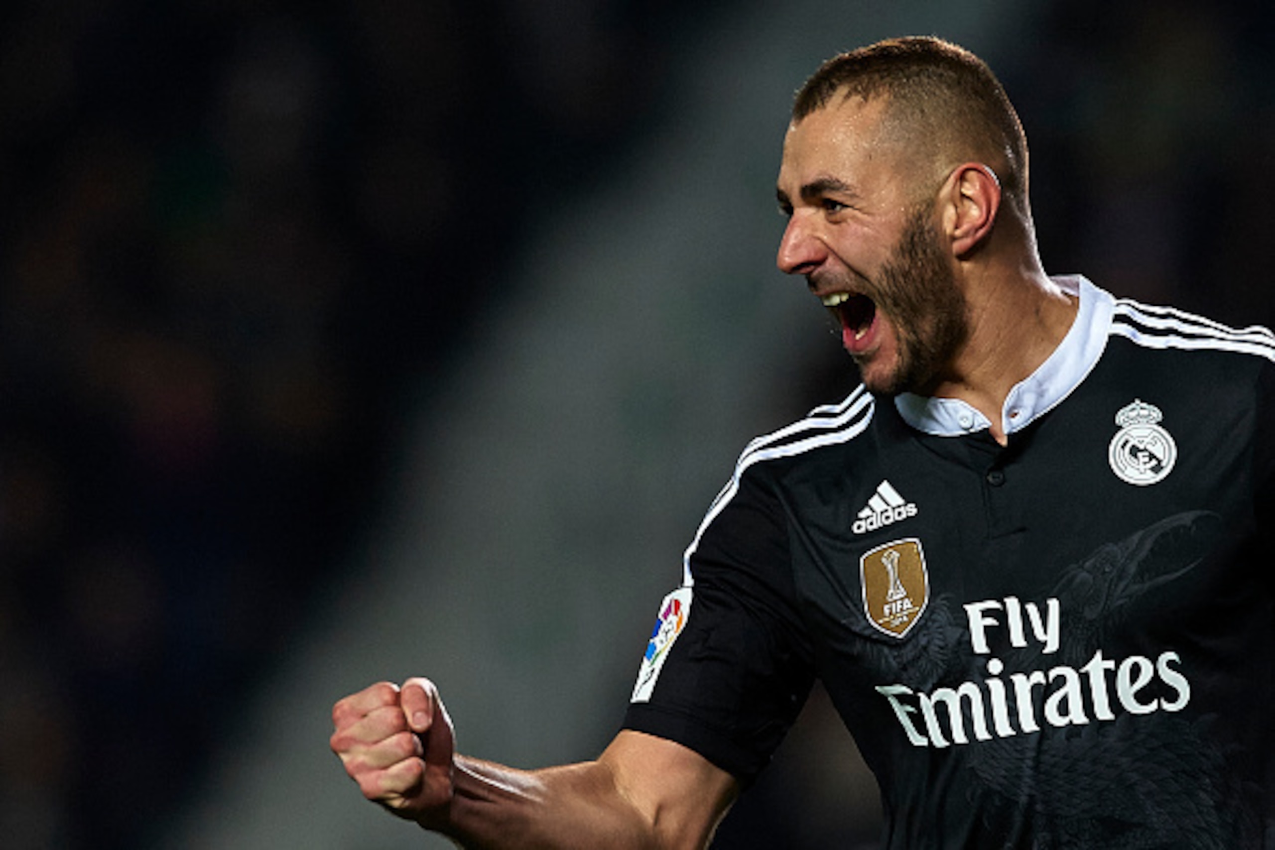 ELCHE, SPAIN - FEBRUARY 22:  Karim Benzema of Real Madrid celebrates after scoring during the La Liga match between Elche FC and Real Madrid at Estadio Manuel Martinez Valero on February 22, 2015 in Elche, Spain.  (Photo by Manuel Queimadelos Alonso/Getty