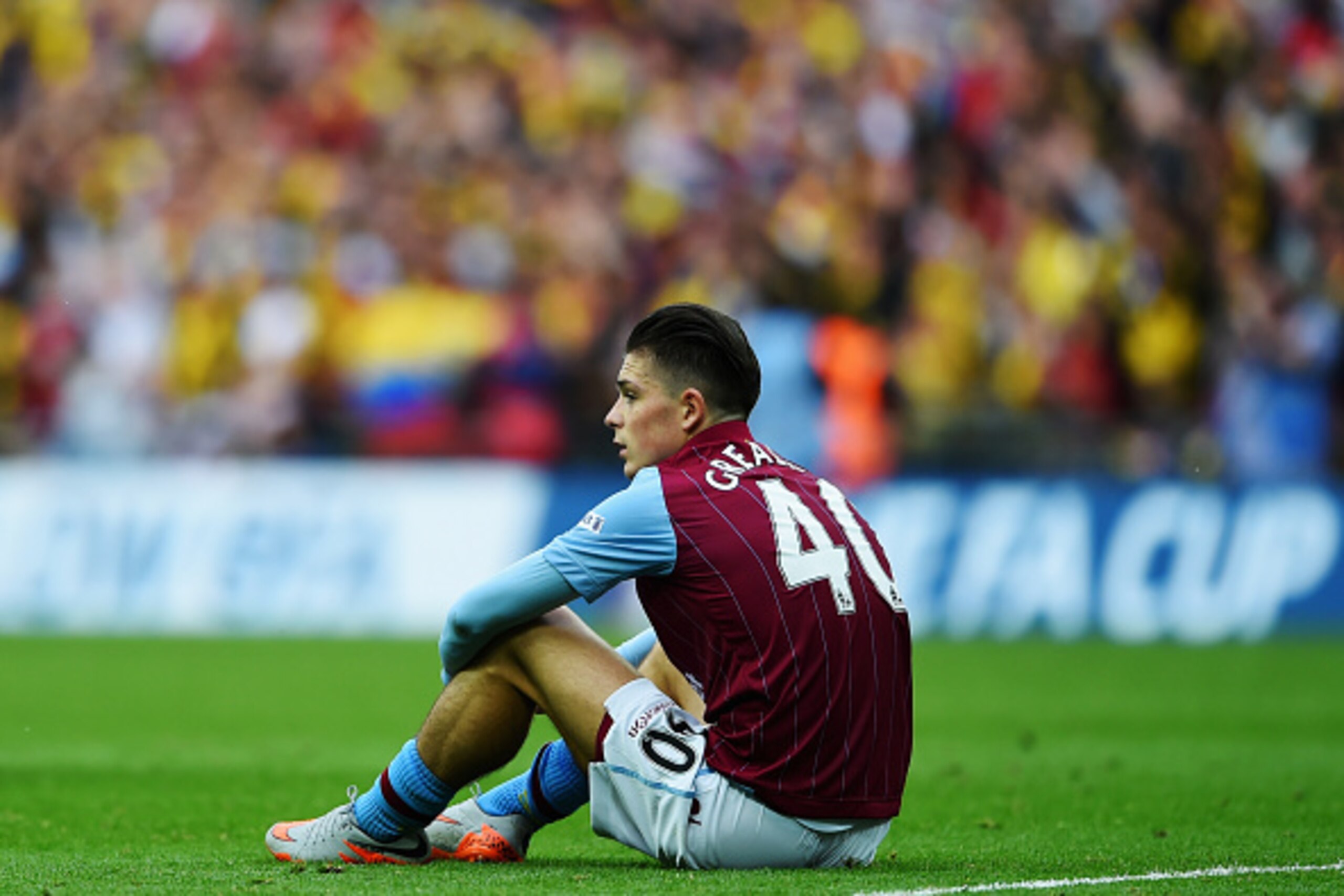 LONDON, ENGLAND - MAY 30: Jack Grealish of Aston Villa looks dejected in defeat after the FA Cup Final between Aston Villa and Arsenal at Wembley Stadium on May 30, 2015 in London, England. Arsenal beat Aston Villa 4-0. (Photo by Shaun Botterill/Getty I LONDON, ENGLAND - MAY 30: Jack Grealish of Aston Villa looks dejected in defeat after the FA Cup Final between Aston Villa and Arsenal at Wembley Stadium on May 30, 2015 in London, England. Arsenal beat Aston Villa 4-0. (Photo by Shaun Botterill/Getty I