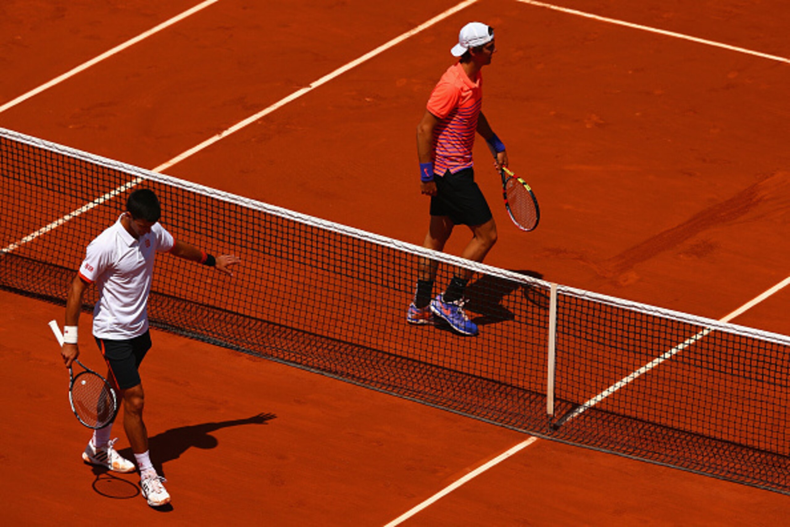 PARIS, FRANCE - MAY 30:  Novak Djokovic of Serbia gestures to Thanasi Kokkinakis of Australia in their Men's Singles match on day seven of the 2015 French Open at Roland Garros on May 30, 2015 in Paris, France.  (Photo by Clive Mason/Getty Images)