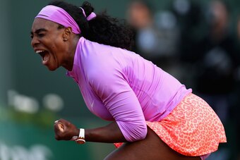 PARIS, FRANCE - MAY 30:  Serena Williams of the United States celebrates a point in her Women's Singles match against Victoria Azarenka of Belarus on day seven of the 2015 French Open at Roland Garros on May 30, 2015 in Paris, France.  (Photo by Clive Bru