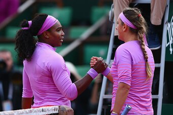 PARIS, FRANCE - MAY 30:  Serena Williams of the United States shakes hands at the net with Victoria Azarenka of Belarus following her victory in their Women's Singles match on day seven of the 2015 French Open at Roland Garros on May 30, 2015 in Paris, Fr