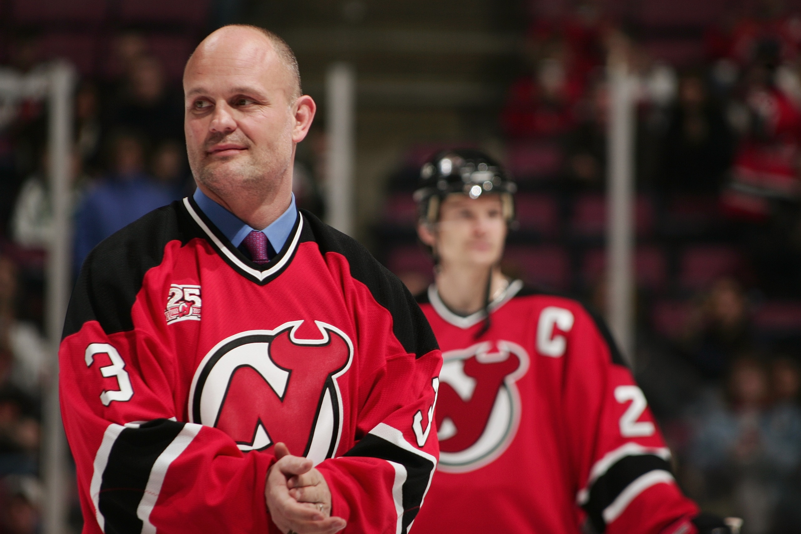 EAST RUTHERFORD, NJ - MARCH 2:  Former New Jersey Devils player Ken Daneyko looks on as the 1999-2000 Stanley Cup-winning Devils team is honored as part of a 25th Anniversary celebration prior to the start of the NHL game against the Toronto Maple Leafs o
