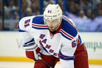 TAMPA, FL - MAY 20:  Rick Nash #61 of the New York Rangers looks on against the Tampa Bay Lightning during Game Three of the Eastern Conference Finals during the 2015 NHL Stanley Cup Playoffs at Amalie Arena on May 20, 2015 in Tampa, Florida.  (Photo by B