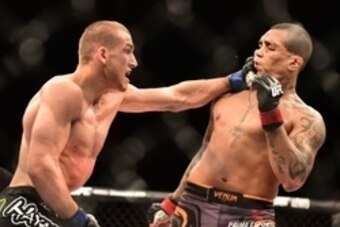 May 30, 2015; Goiania, GO, Brazil; Luiz Dutra (red gloves) fights Tom Breese (blue gloves) during UFC Fight Night at Goiania Arena. Mandatory Credit: Jason Silva-USA TODAY Sports