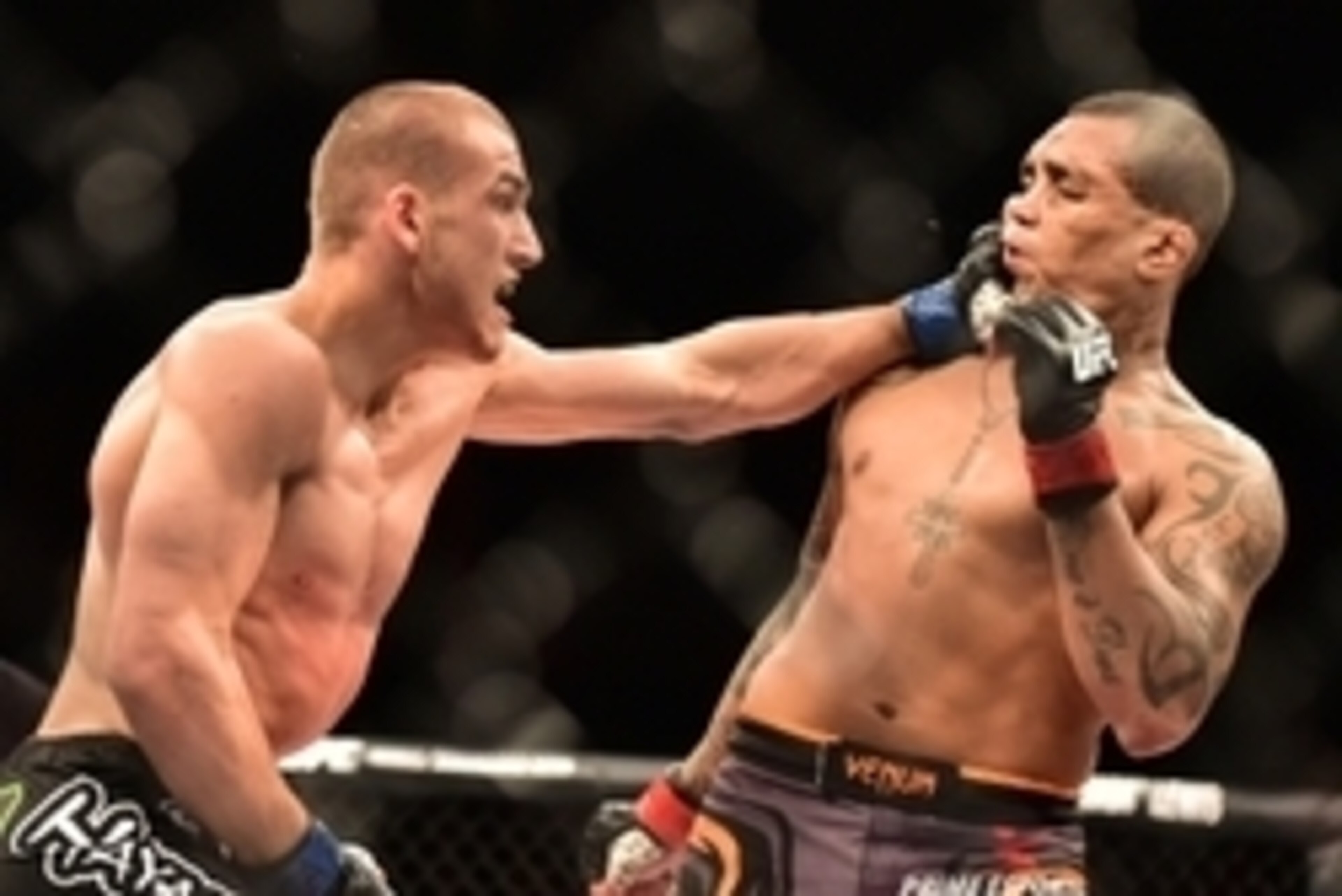 May 30, 2015; Goiania, GO, Brazil; Luiz Dutra (red gloves) fights Tom Breese (blue gloves) during UFC Fight Night at Goiania Arena. Mandatory Credit: Jason Silva-USA TODAY Sports