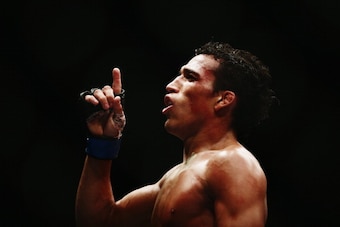 AUCKLAND, NEW ZEALAND - JUNE 28:  Charles Oliveira of Brazil celebrates after winning the UFC Featherweight bout between Charles Oliveira of Brazil and Hatsu Hioki of Japan on June 28, 2014 in Auckland, New Zealand.  (Photo by Hannah Peters/Getty Images)