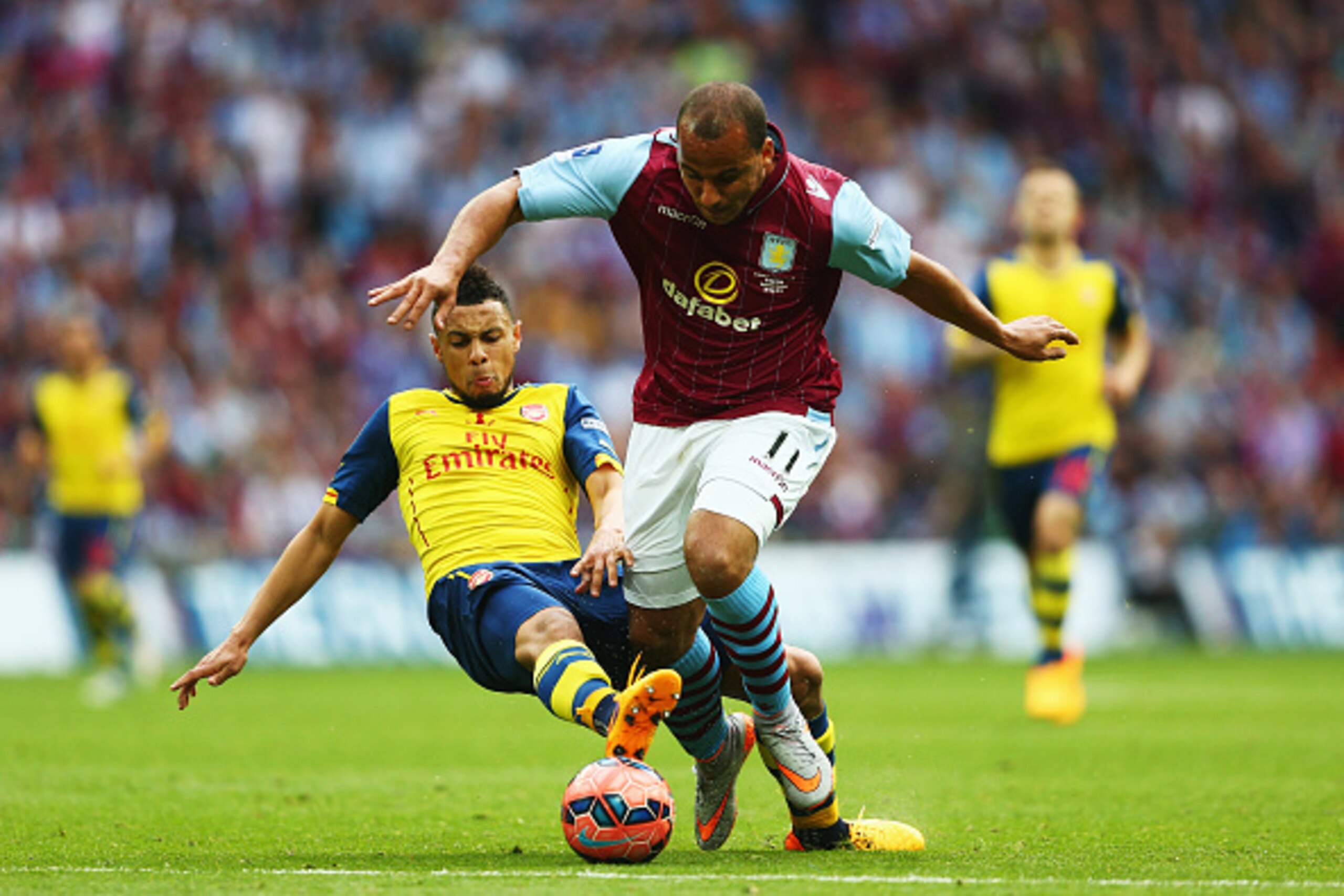 LONDON, ENGLAND - MAY 30:  Gabriel Agbonlahor of Aston Villa is challenged by Francis Coquelin of Arsenal during the FA Cup Final between Aston Villa and Arsenal at Wembley Stadium on May 30, 2015 in London, England.  (Photo by Paul Gilham/Getty Images)