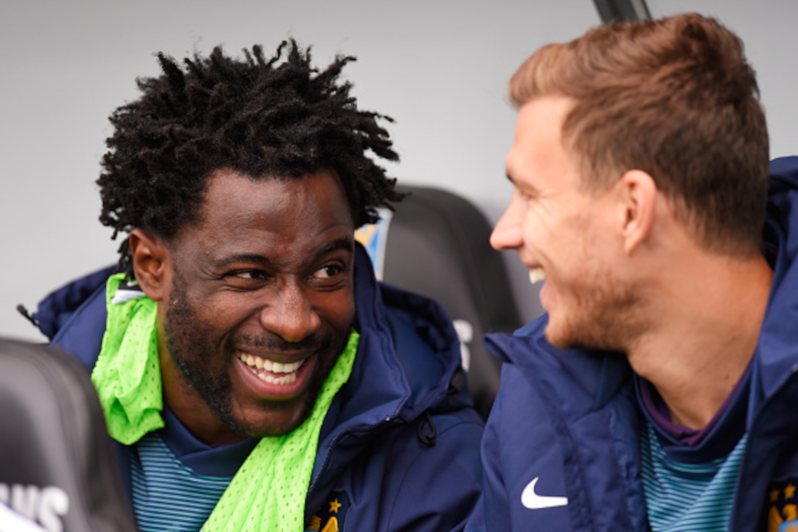 SWANSEA, WALES - MAY 17: (L-R) Substitutes Wilfred Bony of Manchester City and Edin Dzeko of Manchester City chat during the Barclays Premier League match between Swansea and Manchester City at the Liberty Stadium on May 17, 2015 in Swansea, Wales. (Pho SWANSEA, WALES - MAY 17: (L-R) Substitutes Wilfred Bony of Manchester City and Edin Dzeko of Manchester City chat during the Barclays Premier League match between Swansea and Manchester City at the Liberty Stadium on May 17, 2015 in Swansea, Wales. (Pho