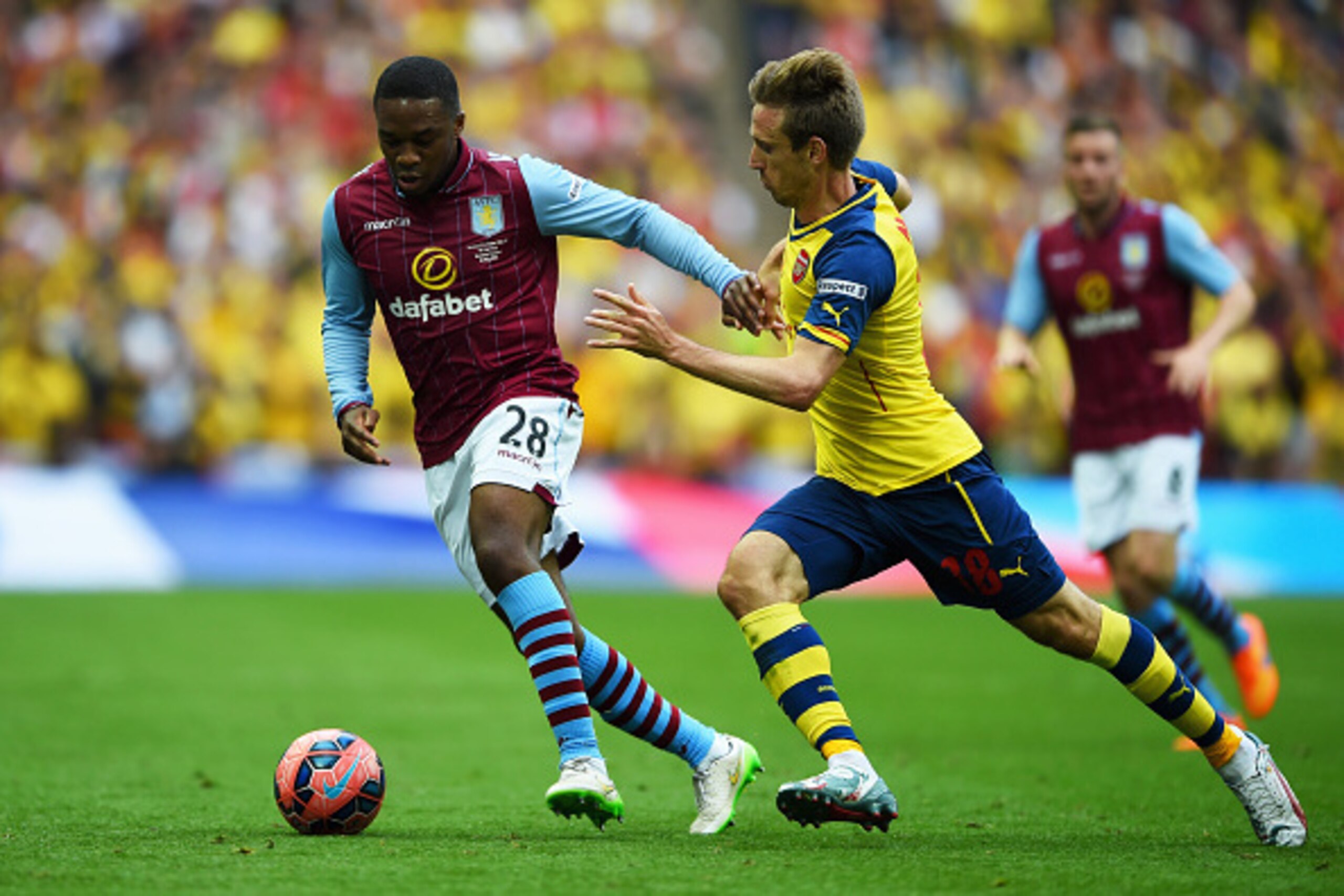 LONDON, ENGLAND - MAY 30:  Charles N'Zogbia of Aston Villa evades Nacho Monreal of Arsenal during the FA Cup Final between Aston Villa and Arsenal at Wembley Stadium on May 30, 2015 in London, England.  (Photo by Shaun Botterill/Getty Images)