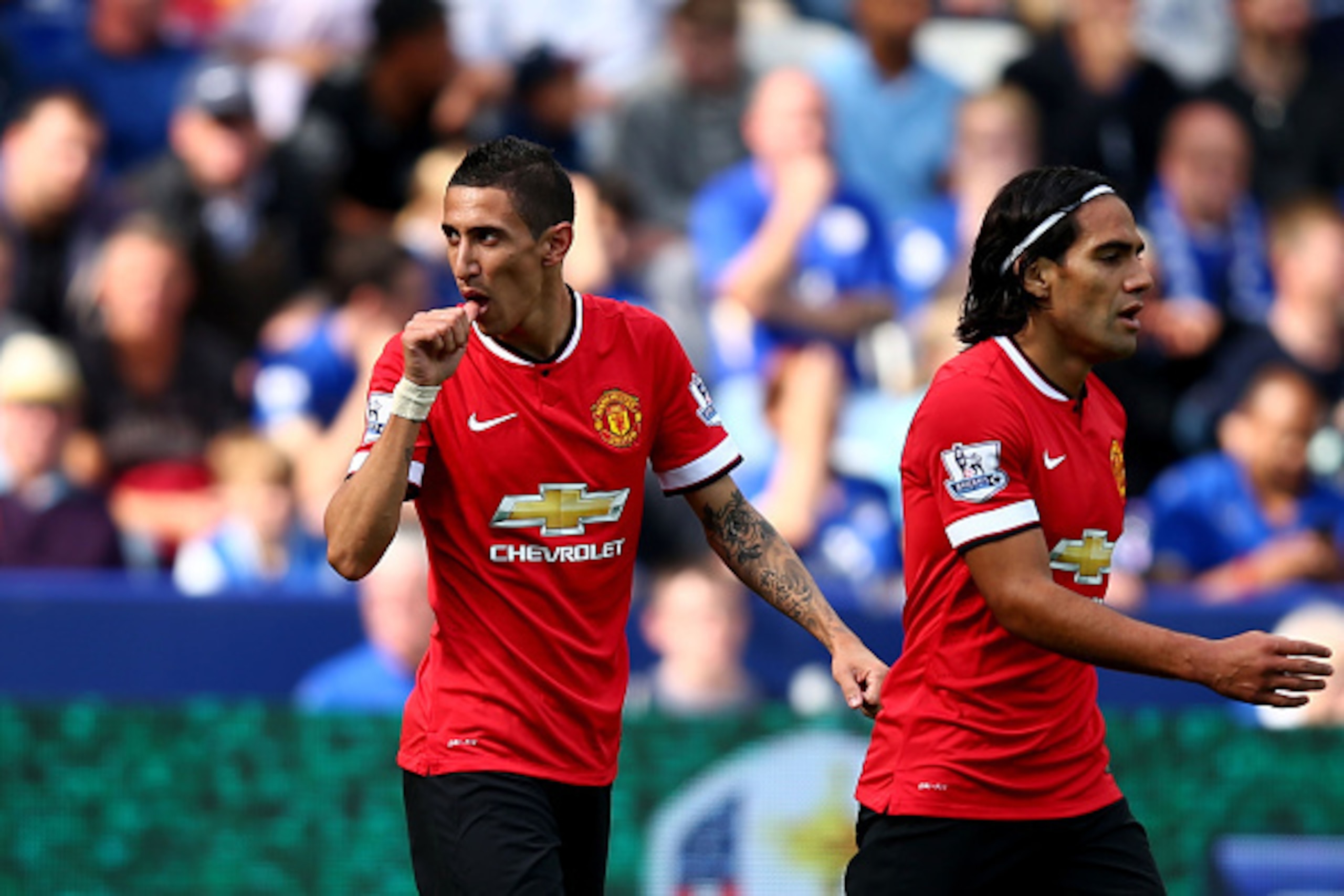 LEICESTER, ENGLAND - SEPTEMBER 21:  Angel di Maria (L) of Manchester United celebrates after scoring his team's second goal during the Barclays Premier League match between Leicester City and Manchester United at The King Power Stadium on September 21, 20