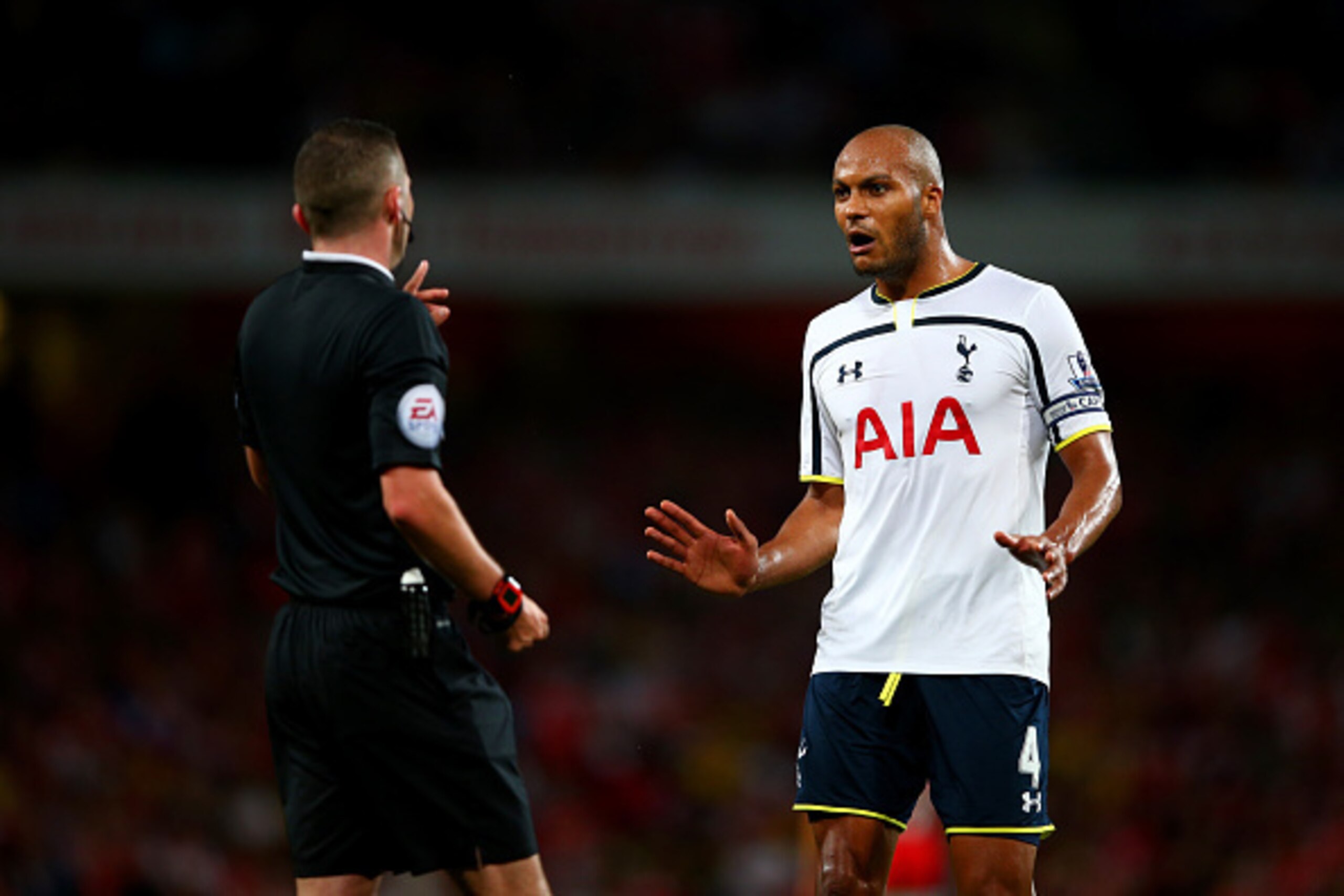 LONDON, ENGLAND - SEPTEMBER 27: Referee Michael Oliver speaks with Younes Kaboul of Spurs about time wasting during the Barclays Premier League match between Arsenal and Tottenham Hotspur at Emirates Stadium on September 27, 2014 in London, England. (Ph LONDON, ENGLAND - SEPTEMBER 27: Referee Michael Oliver speaks with Younes Kaboul of Spurs about time wasting during the Barclays Premier League match between Arsenal and Tottenham Hotspur at Emirates Stadium on September 27, 2014 in London, England. (Ph