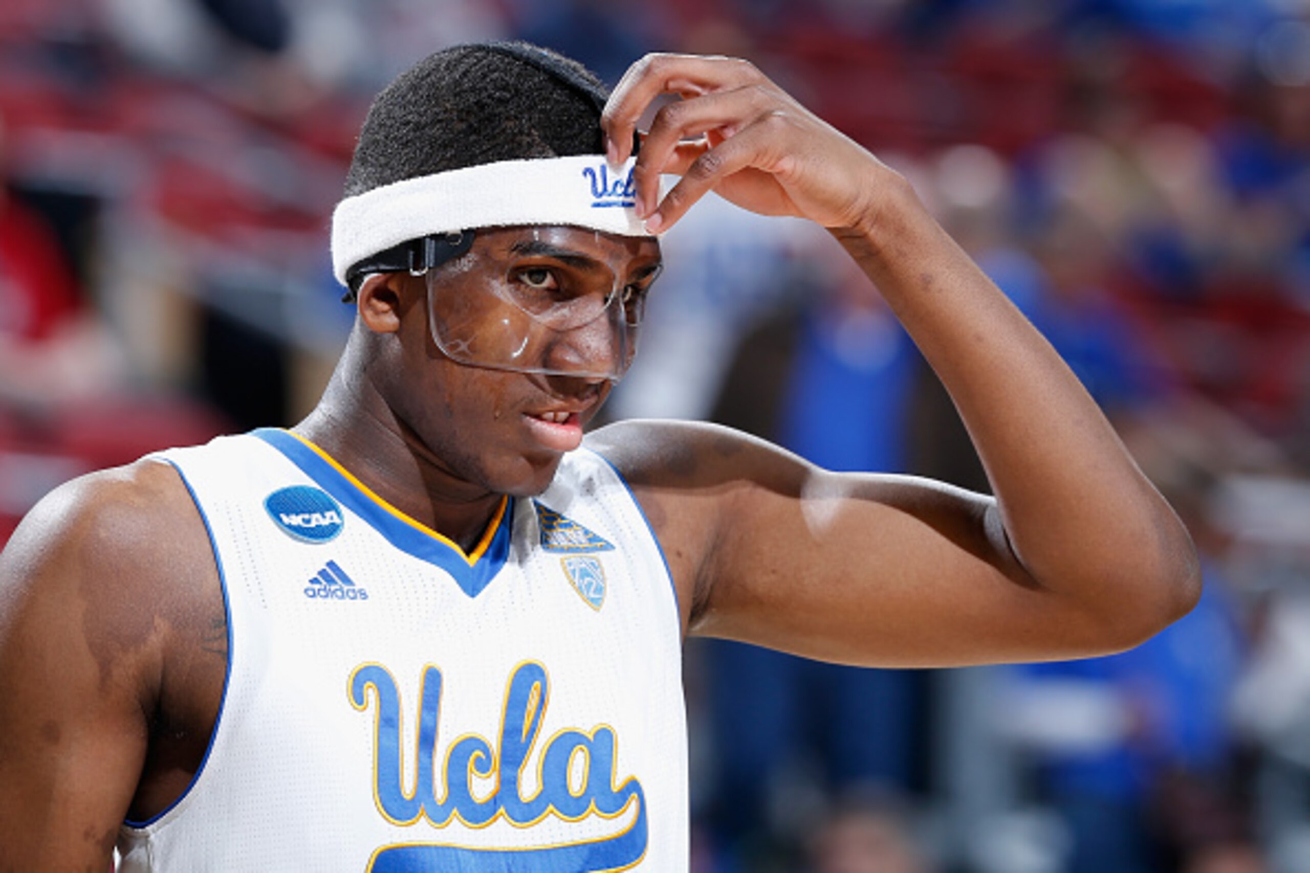 LOUISVILLE, KY - MARCH 21: Kevon Looney #5 of the UCLA Bruins fixes his facemask against the UAB Blazers during the third round of the 2015 NCAA Men's Basketball Tournament at KFC YUM! Center on March 21, 2015 in Louisville, Kentucky. (Photo by Joe Robb LOUISVILLE, KY - MARCH 21: Kevon Looney #5 of the UCLA Bruins fixes his facemask against the UAB Blazers during the third round of the 2015 NCAA Men's Basketball Tournament at KFC YUM! Center on March 21, 2015 in Louisville, Kentucky. (Photo by Joe Robb
