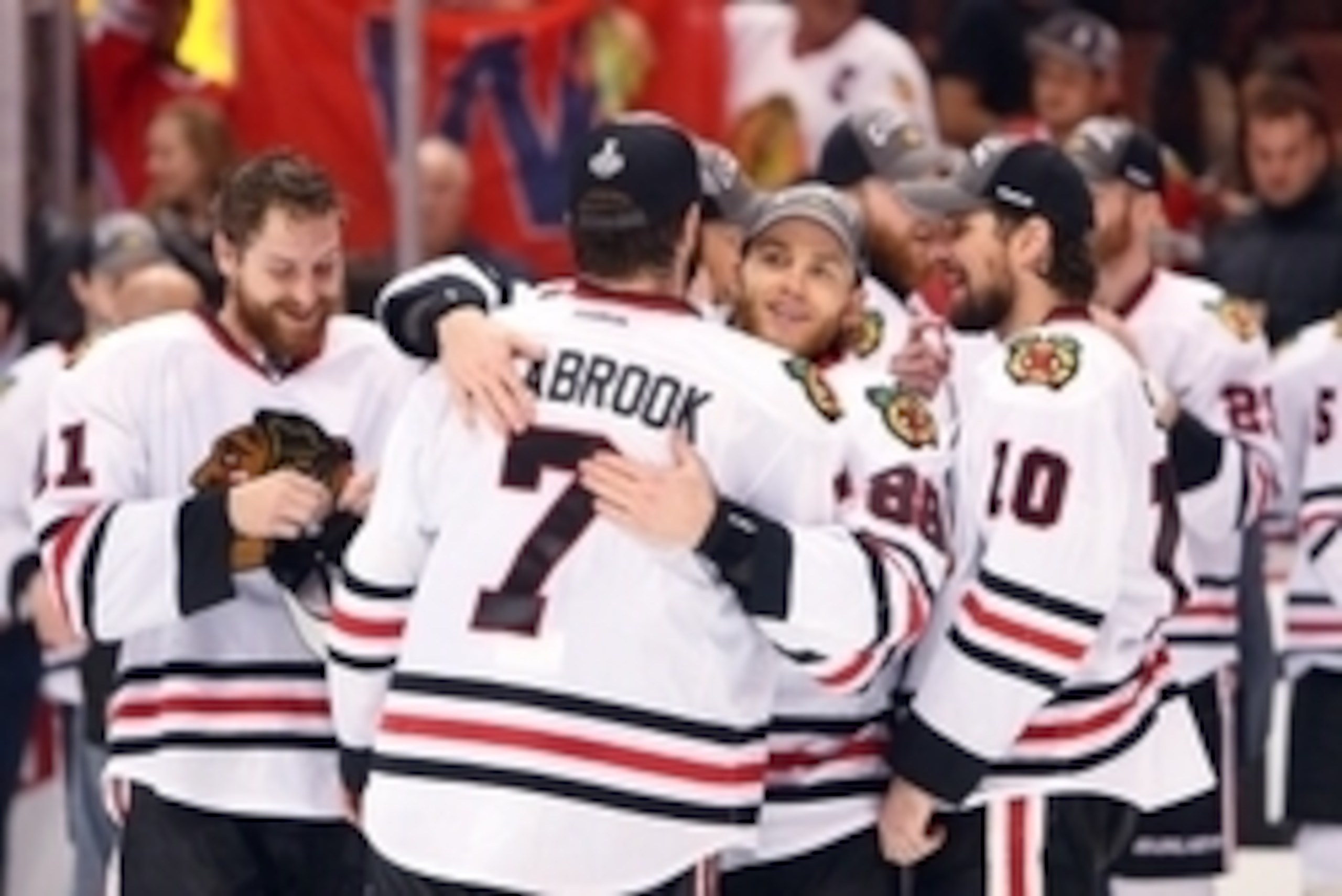 May 30, 2015; Anaheim, CA, USA; Chicago Blackhawks right wing Patrick Kane (88) hugs defenseman Brent Seabrook (7) after game seven of the Western Conference Final of the 2015 Stanley Cup Playoffs against the Anaheim Ducks at Honda Center. Mandatory Credi