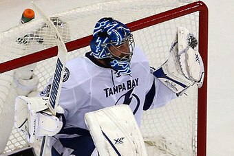 NEW YORK, NY - MAY 29:  Ben Bishop #30 of the Tampa Bay Lightning celebrates after defeating the New York Rangers by a score of 2-0 to win Game Seven of the Eastern Conference Finals during the 2015 NHL Stanley Cup Playoffs at Madison Square Garden on May