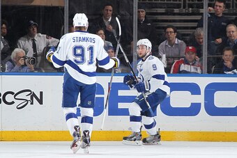NEW YORK, NY - MAY 18:  Tyler Johnson #9 and Steven Stamkos #91 of the Tampa Bay Lightning celebrate after a first period goal against the New York Rangers in Game Two of the Eastern Conference Final during the 2015 NHL Stanley Cup Playoffs at Madison Squ
