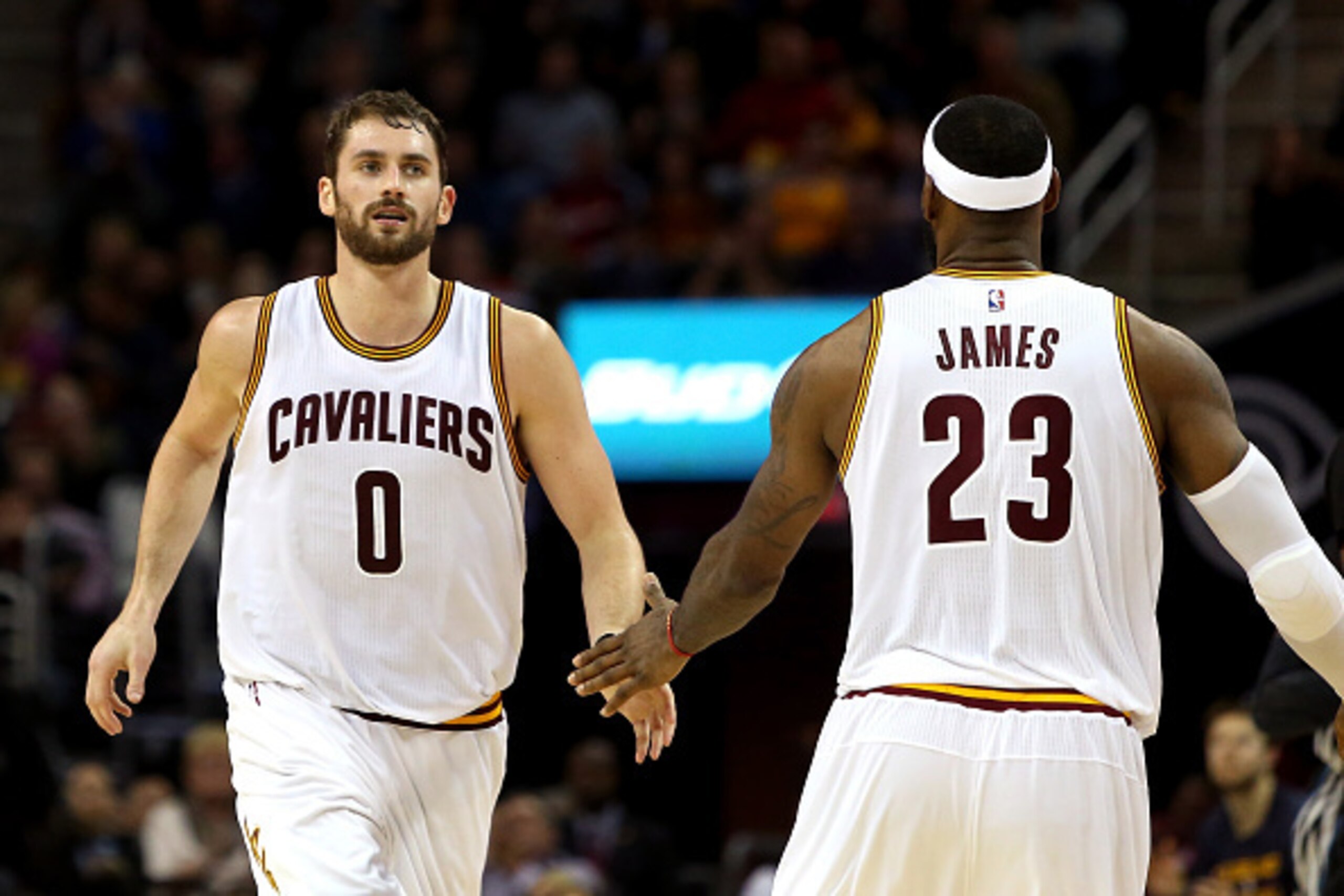 CLEVELAND, OH - DECEMBER 23: Kevin Love #0 and LeBron James #23 of the Cleveland Cavaliers react after a play in the first half against the Minnesota Timberwolves at Quicken Loans Arena on December 23, 2014 in Cleveland, Ohio. NOTE TO USER: User expressly CLEVELAND, OH - DECEMBER 23: Kevin Love #0 and LeBron James #23 of the Cleveland Cavaliers react after a play in the first half against the Minnesota Timberwolves at Quicken Loans Arena on December 23, 2014 in Cleveland, Ohio. NOTE TO USER: User expressly