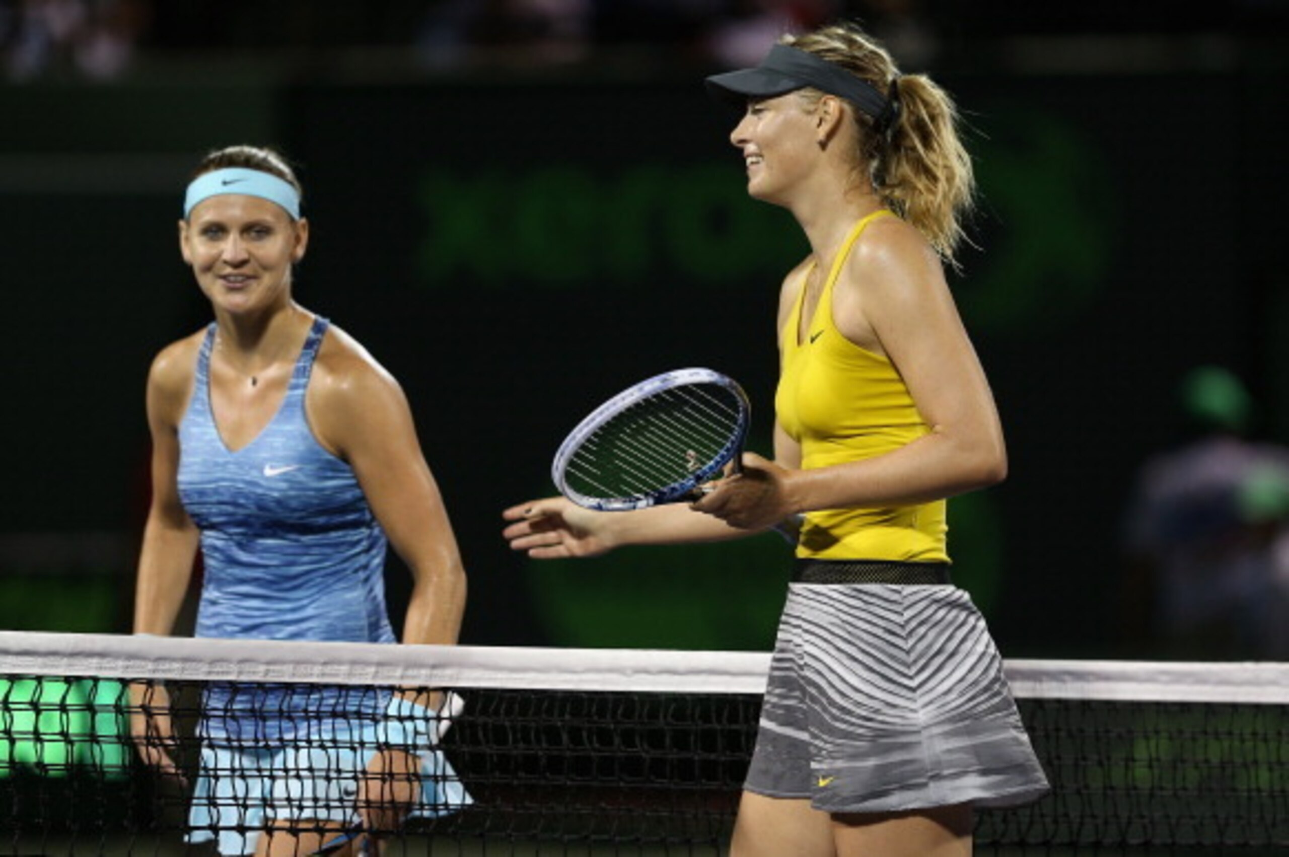 KEY BISCAYNE, FL - MARCH 22:  Maria Sharapova of Russia walks to the net after her three set victory against Lucie Safarova of the Czech Republic during their second round match during day 6 at the Sony Open at Crandon Park Tennis Center on March 22, 2014