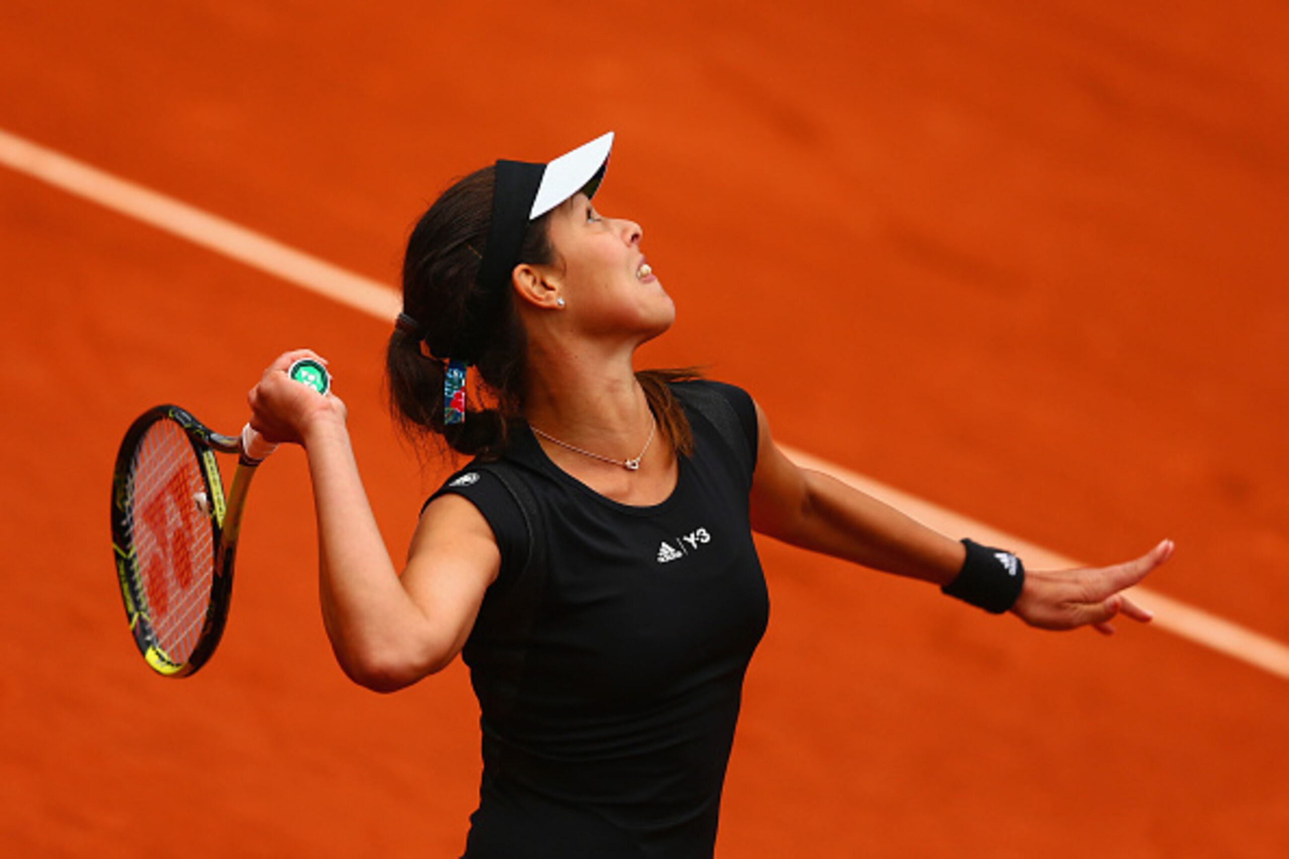 PARIS, FRANCE - MAY 31:  Ana Ivanovic of Serbia serves in her Women's Singles match against Ekaterina Makarova of Russia on day eight of the 2015 French Open at Roland Garros on May 31, 2015 in Paris, France.  (Photo by Clive Mason/Getty Images)
