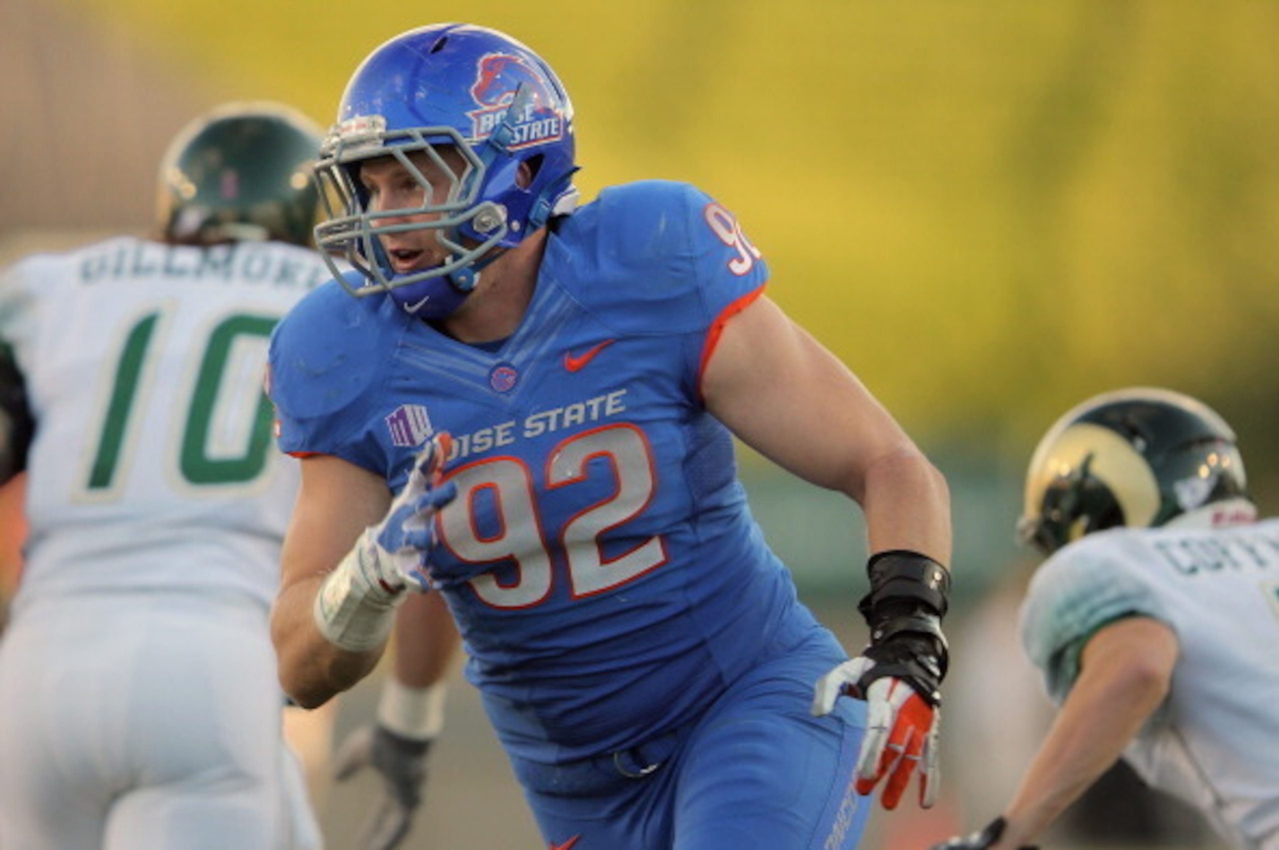 FORT COLLINS, CO - OCTOBER 15:  Shea McClellin #92 of the Boise State Broncos rushes against the Colorado State Rams at Sonny Lubick Field at Hughes Stadium on October 15, 2011 in Fort Collins, Colorado. The Broncos defeated the Rams 63-13.  (Photo by Dou