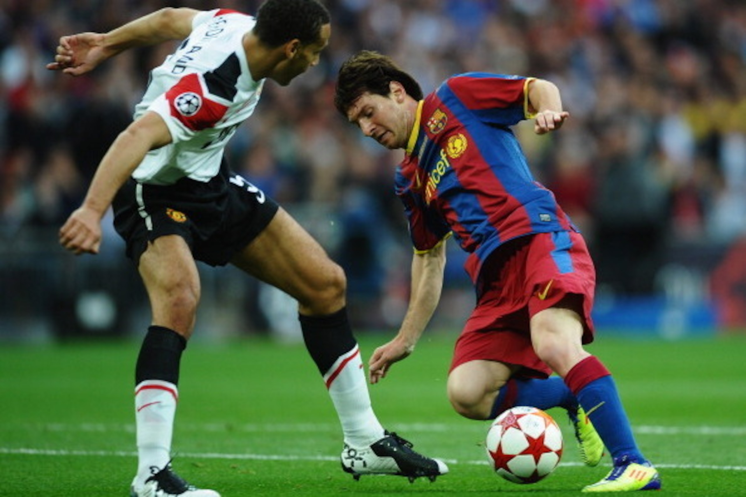 LONDON, ENGLAND - MAY 28:  Lionel Messi of FC Barcelona takes on Rio Ferdinand of Manchester United during the UEFA Champions League final between FC Barcelona and Manchester United FC at Wembley Stadium on May 28, 2011 in London, England.  (Photo by Laur