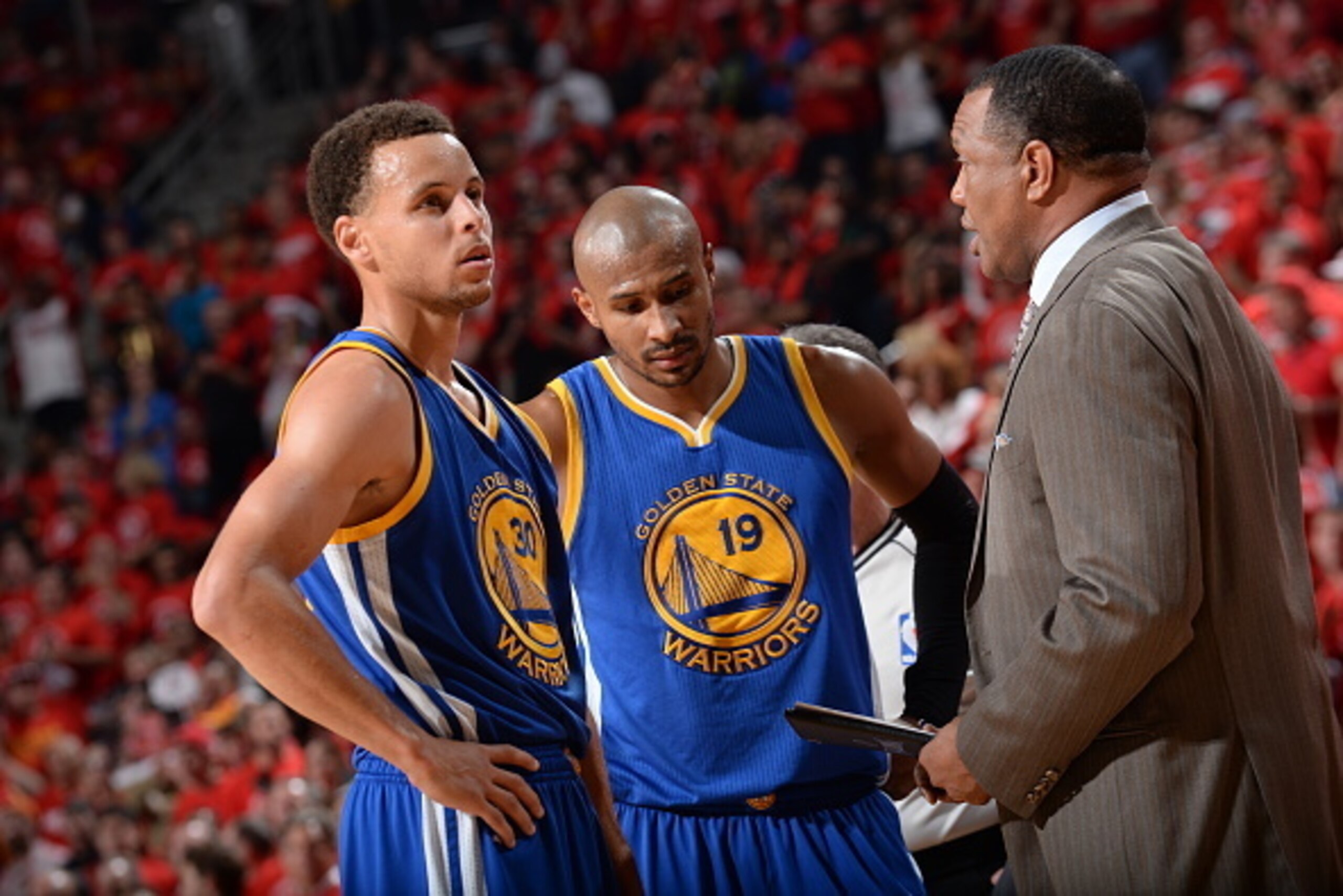 HOUSTON, TX - MAY 25: Stephen Curry #30, Leandro Barbosa #19, and Alvin Gentry of the Golden State Warriors speak during a game against the Houston Rockets in Game Four of the Western Conference Finals during the 2015 NBA Playoffs on May 25, 2015 at the T