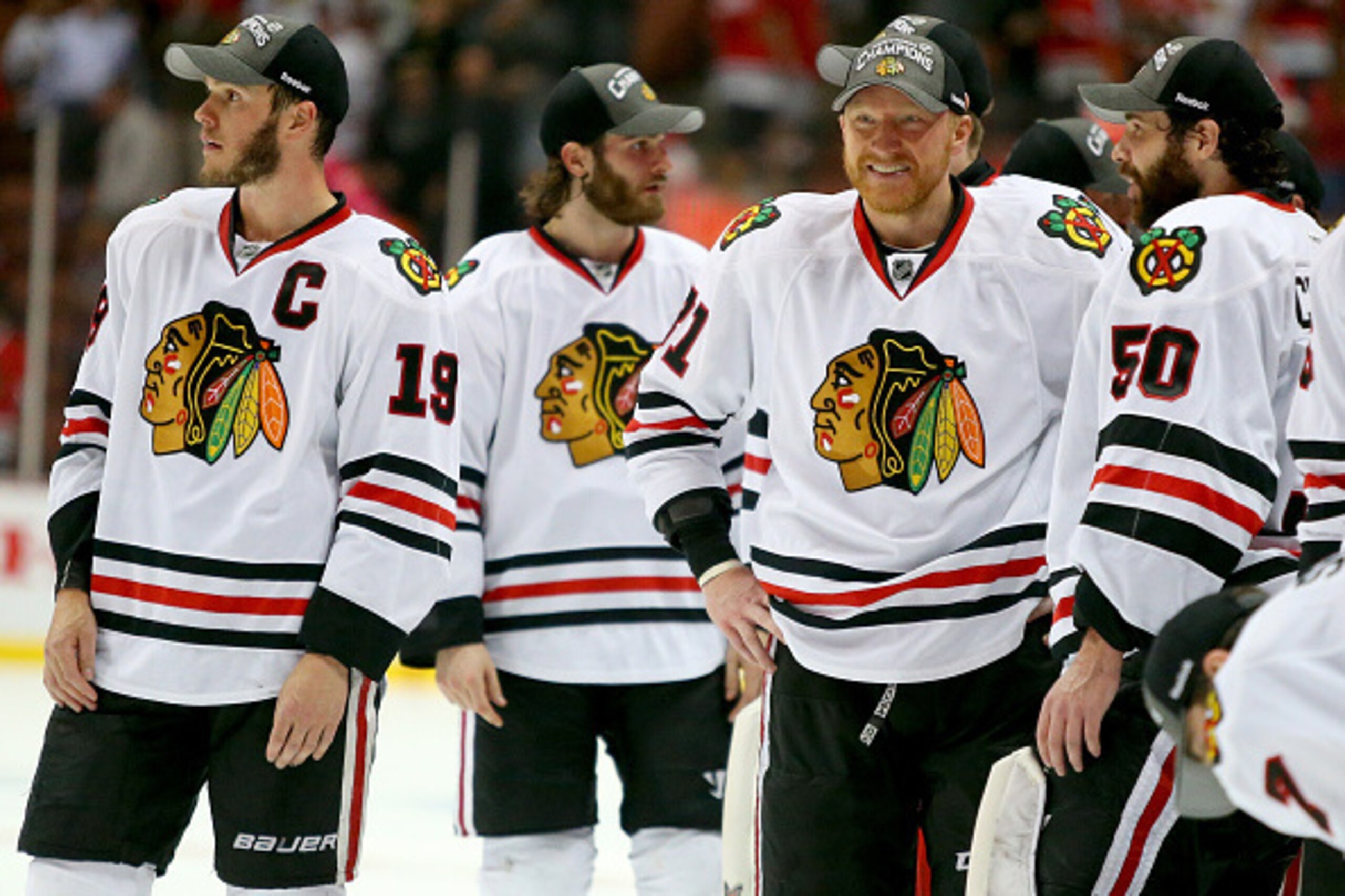 ANAHEIM, CA - MAY 30:  Jonathan Toews #19 and Marian Hossa #81 of the Chicago Blackhawks celebrate the Blackhawks 5-3 victory against the Anaheim Ducks in Game Seven of the Western Conference Finals during the 2015 NHL Stanley Cup Playoffs at the Honda Ce