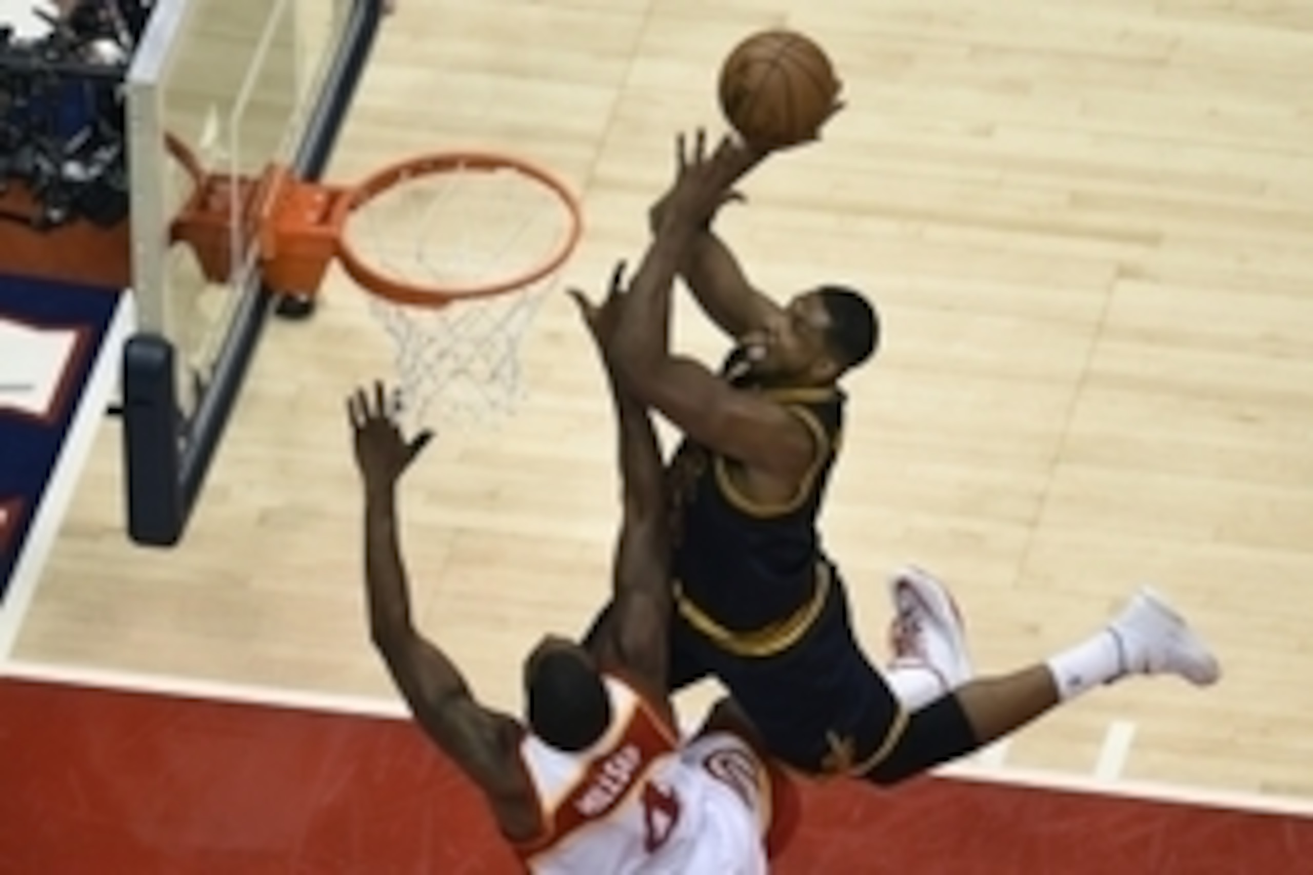 May 22, 2015; Atlanta, GA, USA; Cleveland Cavaliers center Tristan Thompson (13) drives to the basket against Atlanta Hawks forward Paul Millsap (4) during the second quarter in game two of the Eastern Conference Finals of the NBA Playoffs at Philips Aren