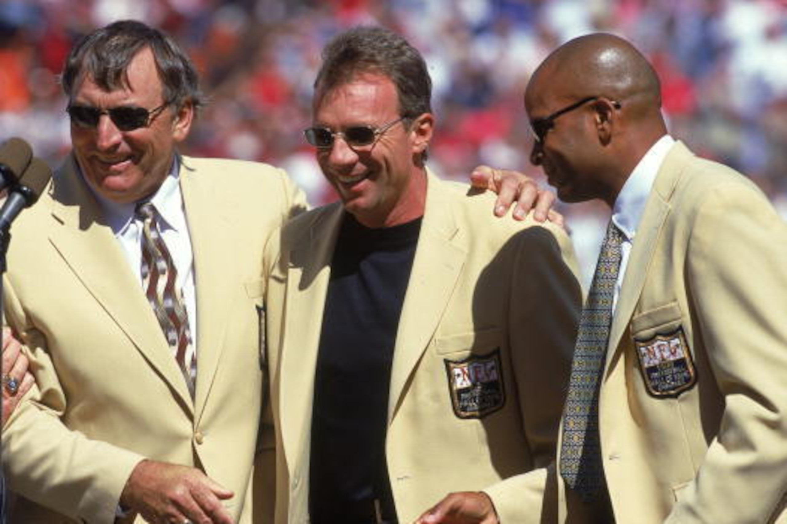 10 Sep 2000: Ronnie Lott of the Ex-San Francisco 49ers talks to the crowd with Dave Wilcox and Joe Montana during the game against the Carolina Panthers at 3Com Park in San Francisco, California. The Panthers defeated the 49ers 38-22.Mandatory Credit: Tom