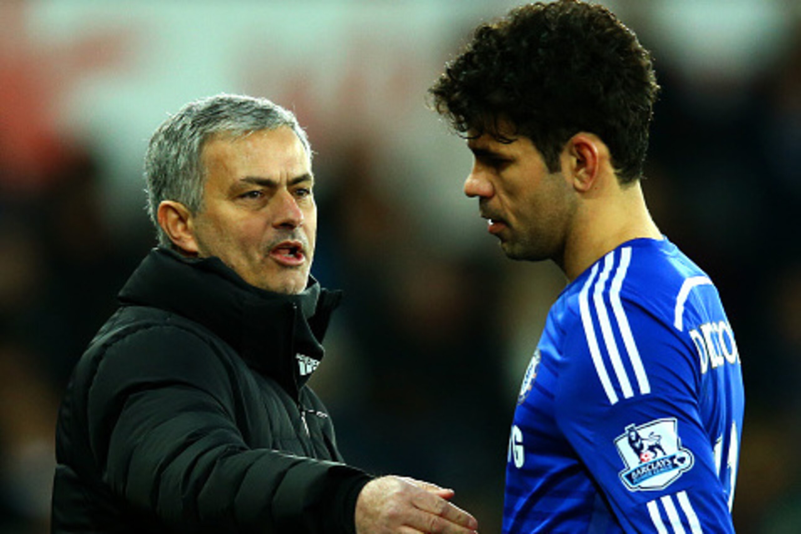 SWANSEA, WALES - JANUARY 17: Jose Mourinho, manager of Chelsea speaks with Diego Costa as he is substituted during the Barclays Premier League match between Swansea City and Chelsea at Liberty Stadium on January 17, 2015 in Swansea, Wales. (Photo by Ric SWANSEA, WALES - JANUARY 17: Jose Mourinho, manager of Chelsea speaks with Diego Costa as he is substituted during the Barclays Premier League match between Swansea City and Chelsea at Liberty Stadium on January 17, 2015 in Swansea, Wales. (Photo by Ric