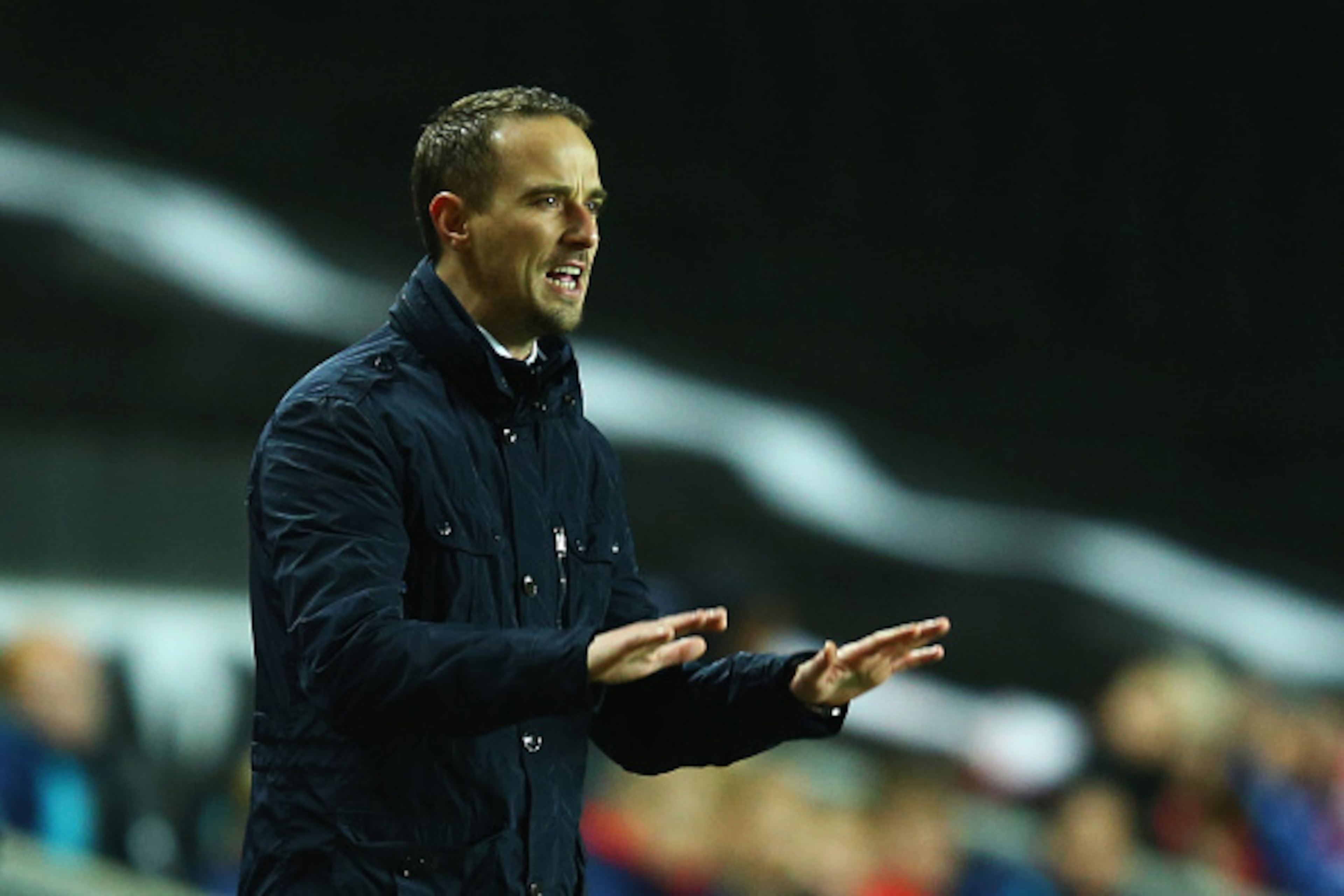 MILTON KEYNES, ENGLAND - FEBRUARY 13:  Mark Sampson manager of England gives instructions during the Women's Friendly International match between England and USA at Stadium mk on February 13, 2015 in Milton Keynes, England.  (Photo by Richard Heathcote/Ge