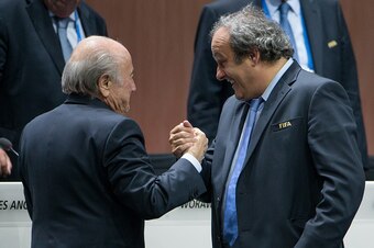 ZURICH, SWITZERLAND - MAY 29: FIFA President Joseph S. Blatter (L) shakes hands with UEFA president Michel Platini during the 65th FIFA Congress at Hallenstadion on May 29, 2015 in Zurich, Switzerland. (Photo by Philipp Schmidli/Getty Images)