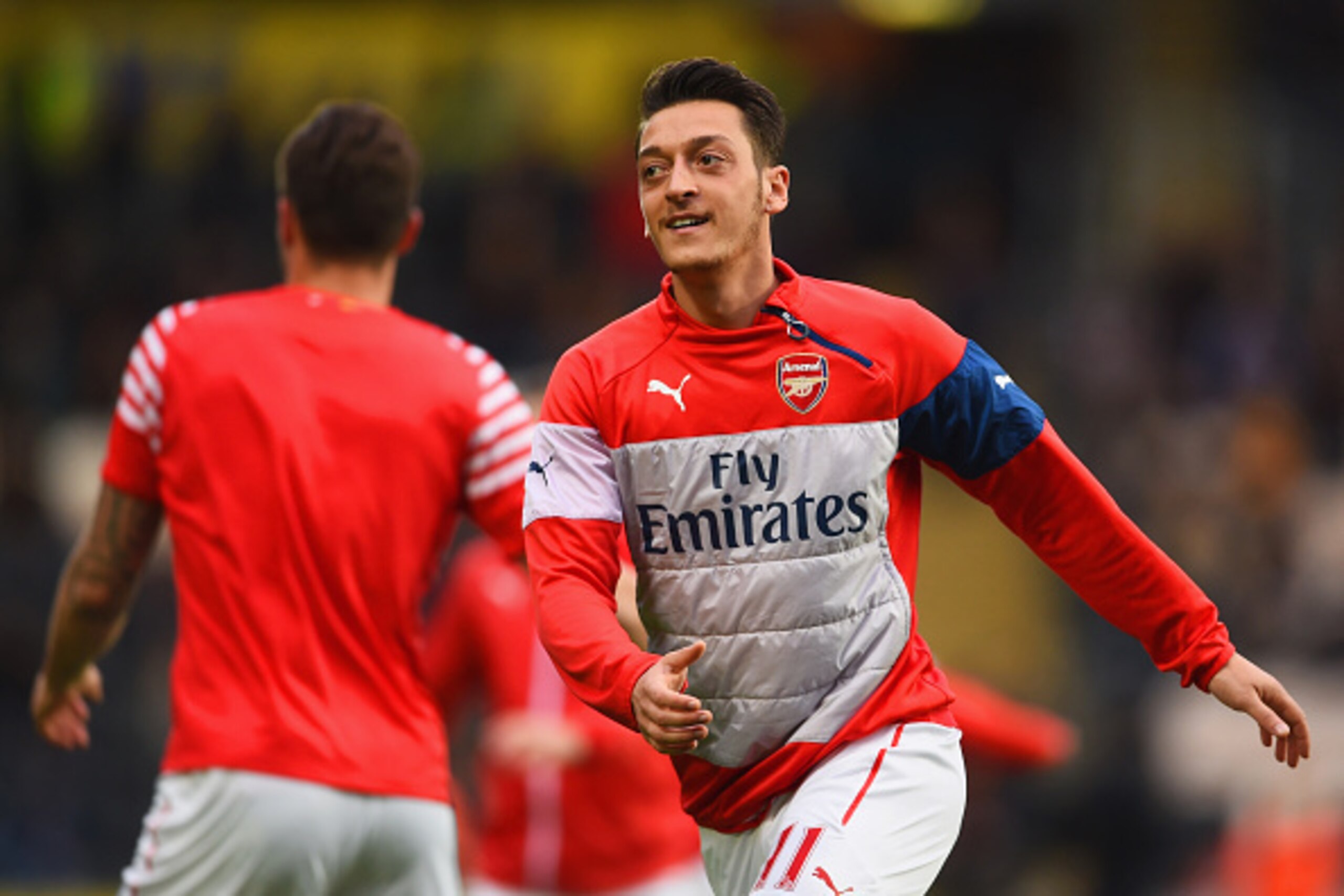 HULL, ENGLAND - MAY 04:  Mesut Oezil of Arsenal (C) warms up  prior to the Barclays Premier League match between Hull City and Arsenal at KC Stadium on May 4, 2015 in Hull, England.  (Photo by Laurence Griffiths/Getty Images)