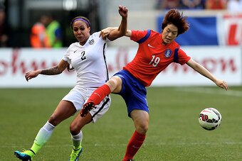 HARRISON, NJ - MAY 30:  Sydney Leroux #2 of United States and Doyeon Kim #19 of South Korea fight for the ball during an international friendly match at Red Bull Arena on May 30, 2015 in Harrison, New Jersey.  (Photo by Elsa/Getty Images)
