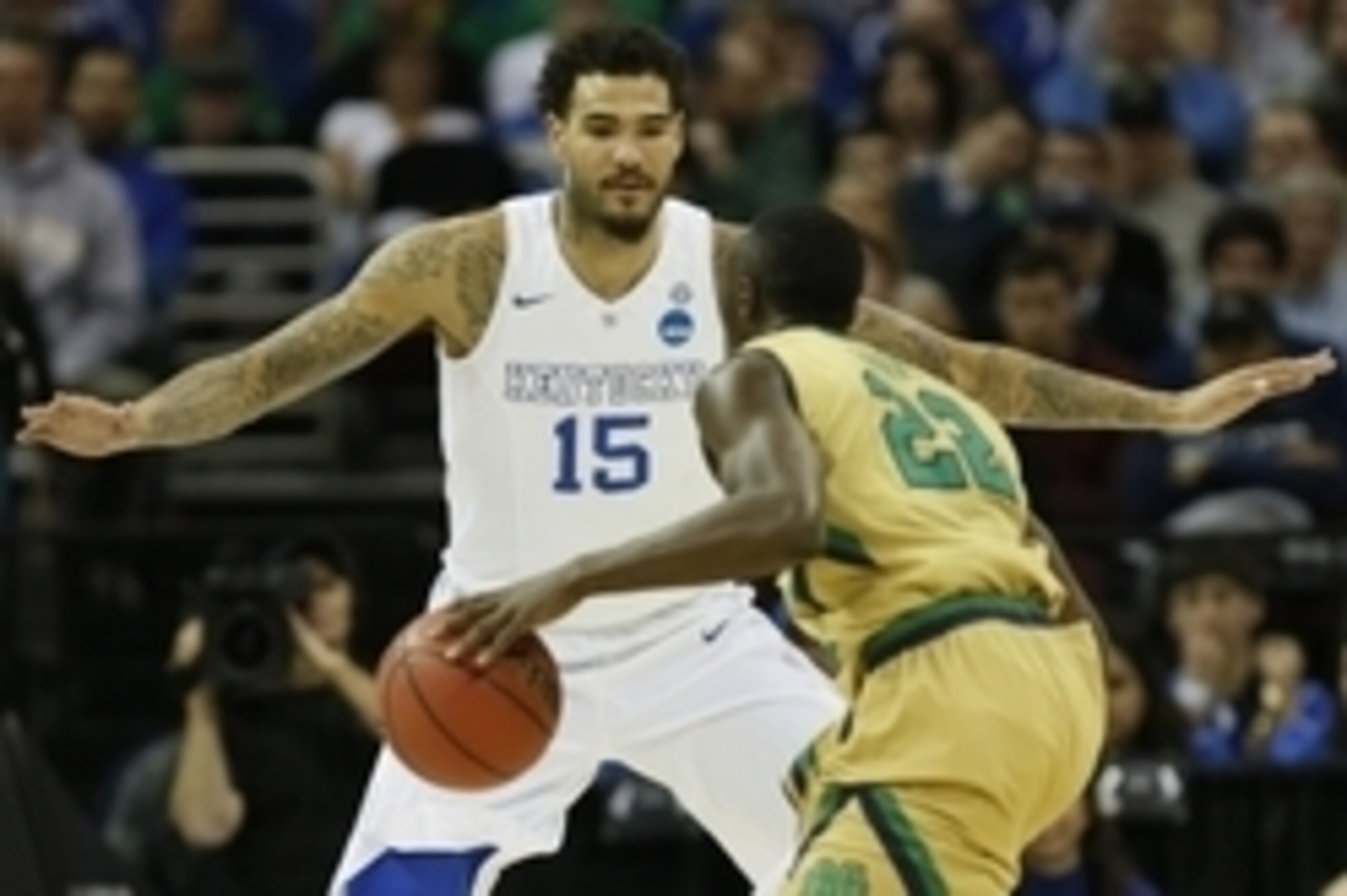 Mar 28, 2015; Cleveland, OH, USA; Kentucky Wildcats forward Willie Cauley-Stein (15) guards Notre Dame Fighting Irish guard Jerian Grant (22)  during the first half in the finals of the midwest regional of the 2015 NCAA Tournament at Quicken Loans Arena. 