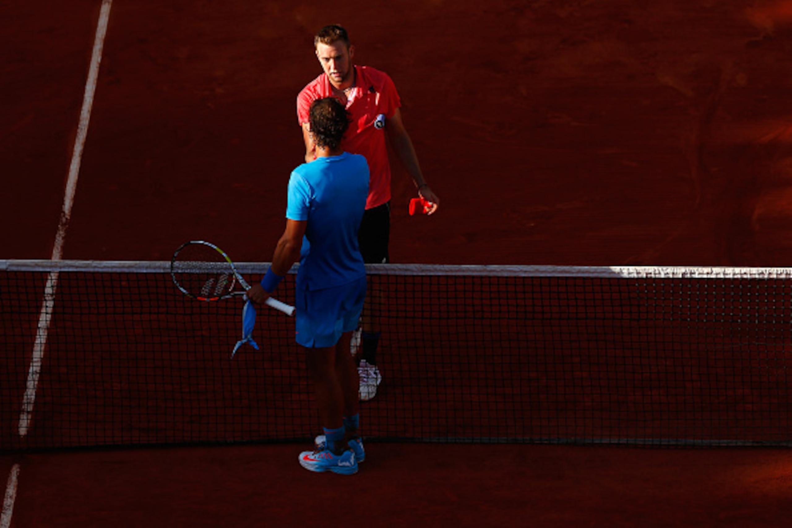 PARIS, FRANCE - JUNE 01:  Rafael Nadal of Spain shakes hands with Jack Sock of the United States after beating him im their Men's Singles match on day nine of the 2015 French Open at Roland Garros on June 1, 2015 in Paris, France.  (Photo by Julian Finney