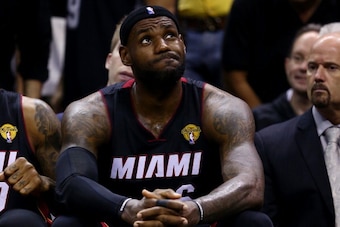 SAN ANTONIO, TX - JUNE 15:  LeBron James #6 of the Miami Heat reacts on the bench against the San Antonio Spurs during Game Five of the 2014 NBA Finals at the AT&T Center on June 15, 2014 in San Antonio, Texas. NOTE TO USER: User expressly acknowledges an