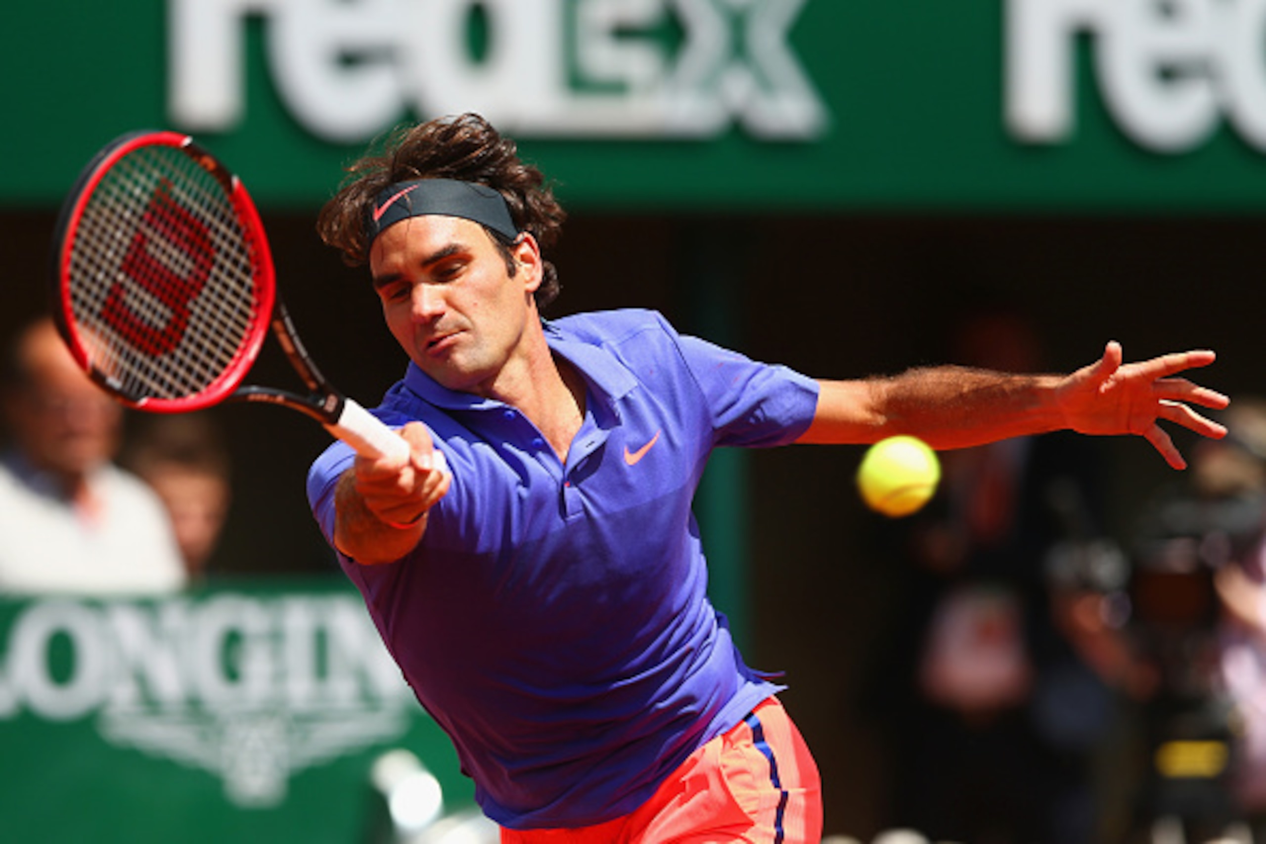 PARIS, FRANCE - JUNE 01:  Roger Federer of Switzerland plays a forehand in his Men's Singles match against Gael Monfils of France on day nine of the 2015 French Open at Roland Garros on June 1, 2015 in Paris, France.  (Photo by Clive Brunskill/Getty Image