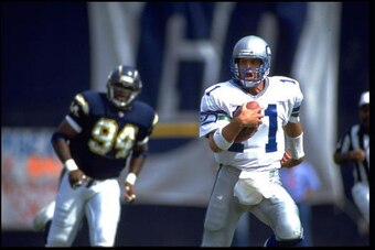 4 OCT 1992:  SEATTLE SEAHAWKS QUARTERBACK KELLY STOUFFER #11 RUNS WITH THE FOOTBALL DURING THE SEAHAWKS 17-6 LOSS TO THE SAN DIEGO CHARGERS AT JACK MURPHY STADIUM IN SAN DIEGO, CALIFORNIA.  MANDATORY CREDIT:  CHRIS COVATTA/ALLSPORT