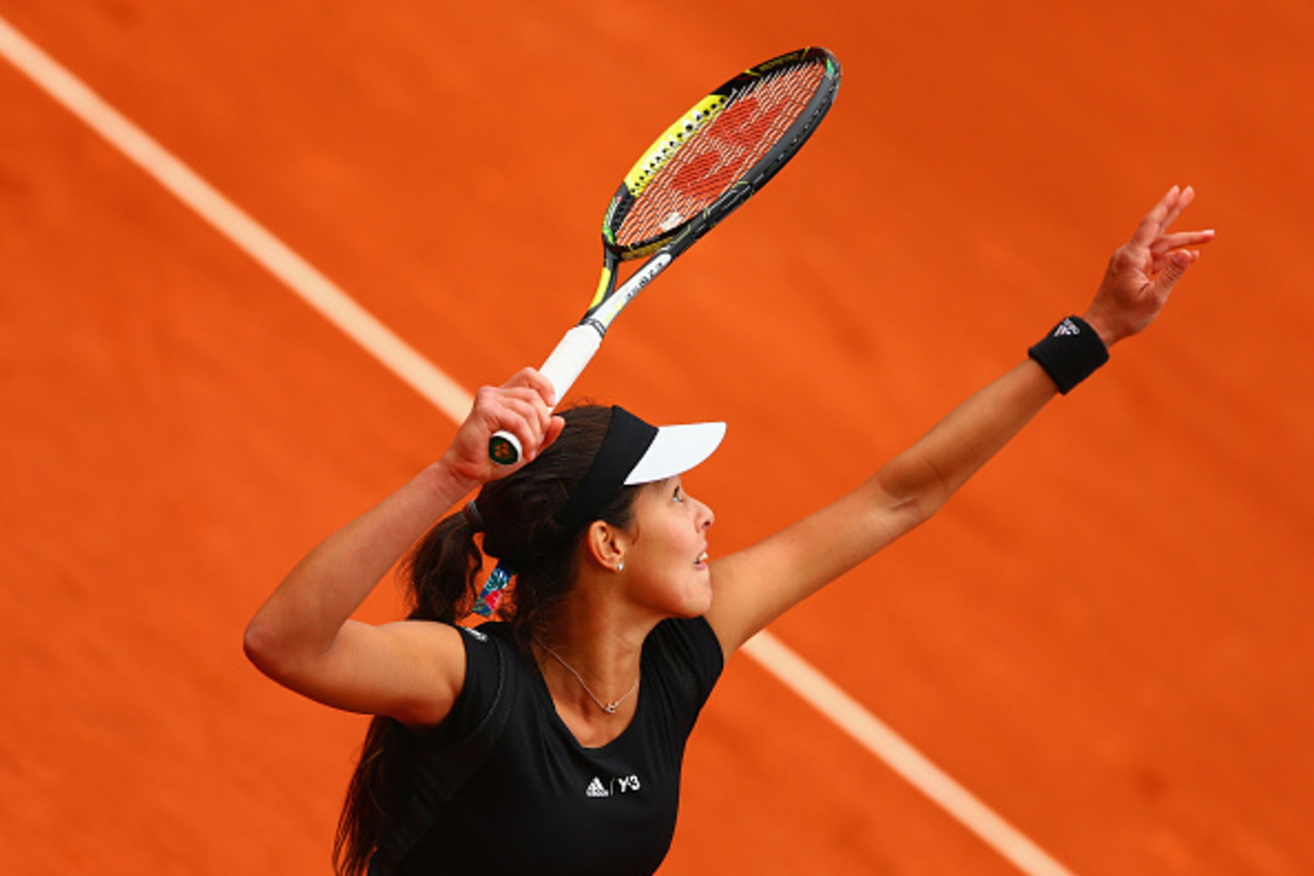 PARIS, FRANCE - MAY 31:  Ana Ivanovic of Serbia serves in her Women's Singles match against Ekaterina Makarova of Russia on day eight of the 2015 French Open at Roland Garros on May 31, 2015 in Paris, France.  (Photo by Clive Mason/Getty Images)