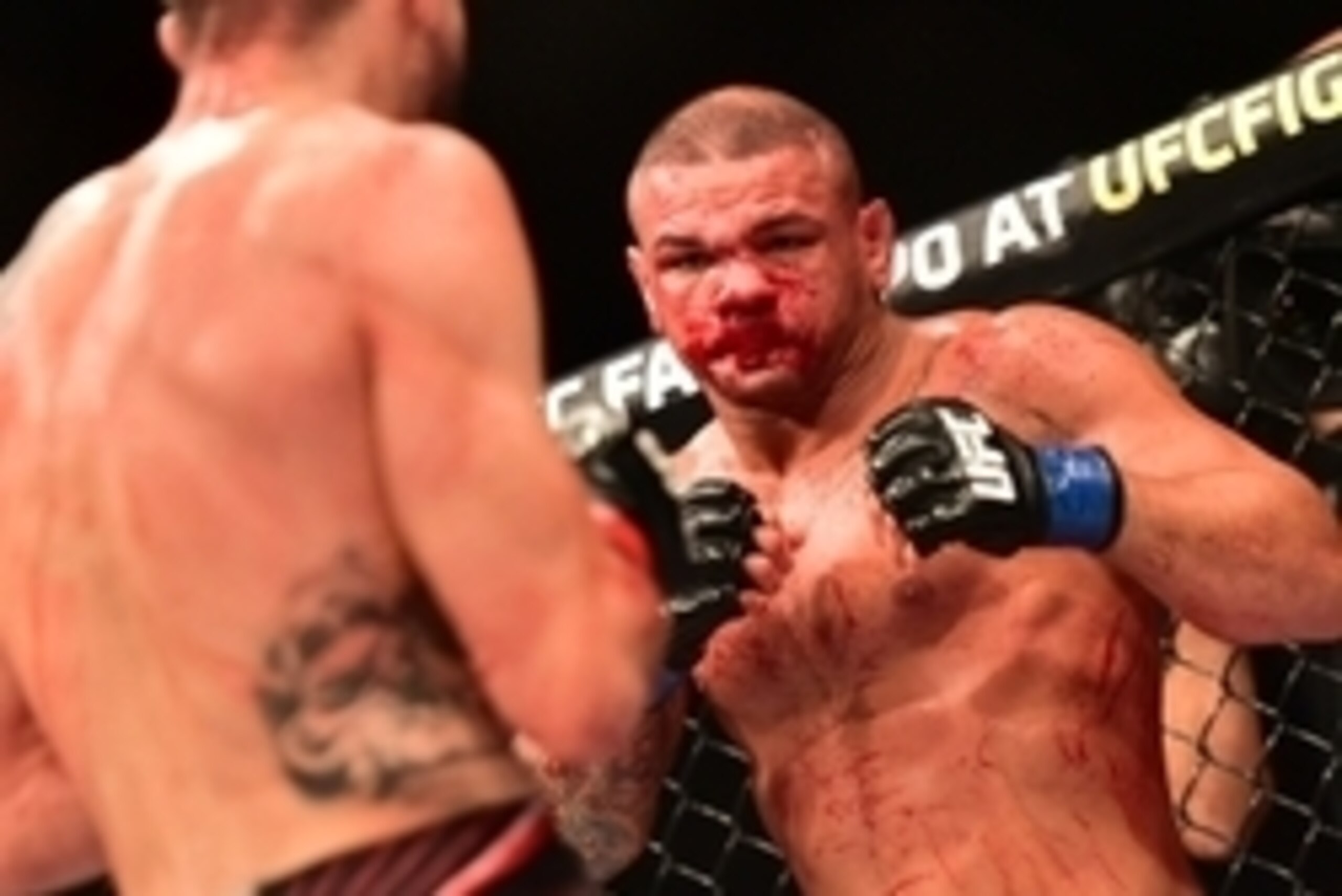 May 30, 2015; Goiania, GO, Brazil; Carlos Condit (red gloves) fights Thiago Alves (blue gloves) during UFC Fight Night at Goiania Arena. Mandatory Credit: Jason Silva-USA TODAY Sports