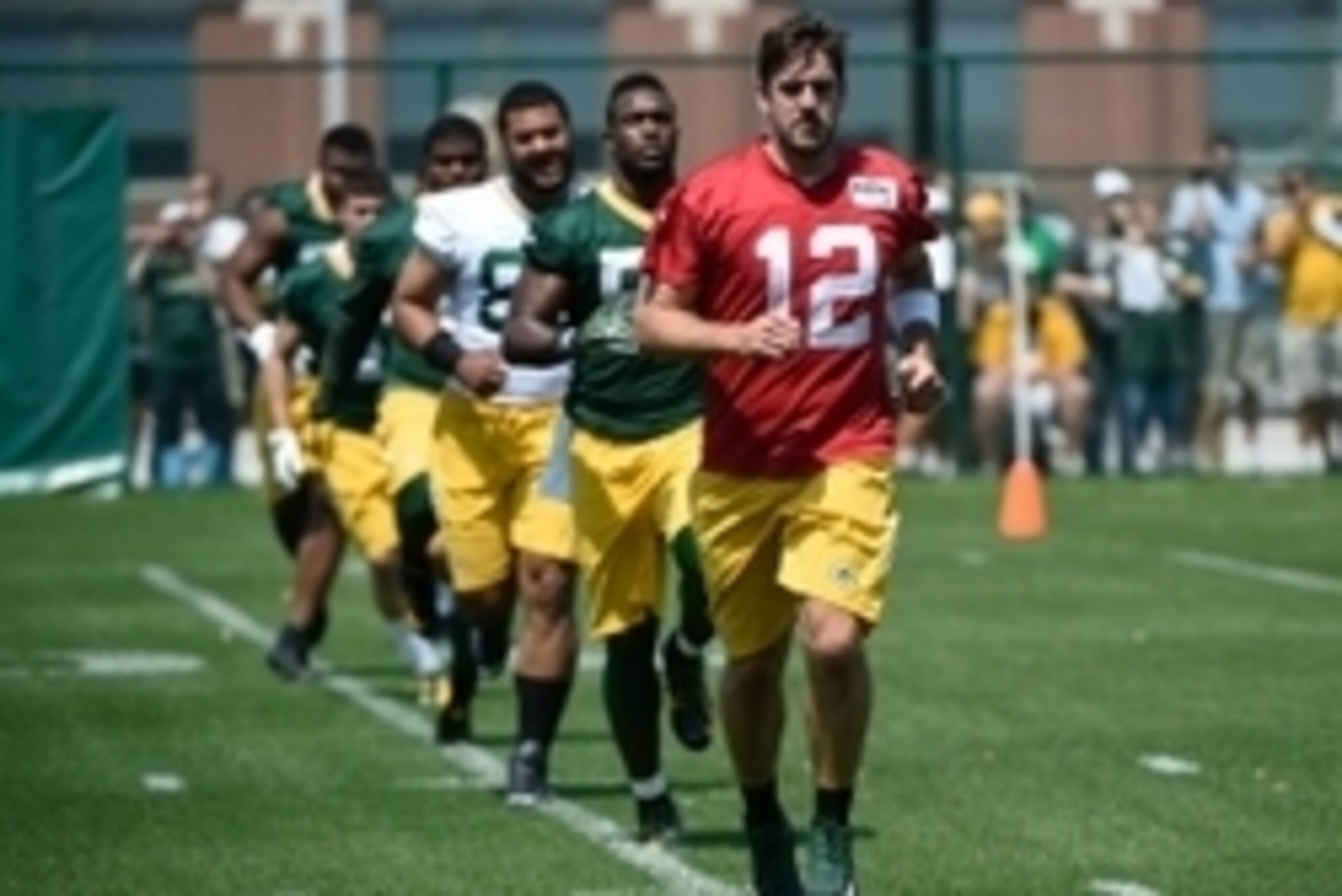 May 28, 2015; Green Bay, WI, USA; Green Bay Packers quarterback Aaron Rodgers (12) warms up during Rookie Orientation Camp and Organized Team Activities at the Don Hutson Center in Green Bay. Mandatory Credit: Benny Sieu-USA TODAY Sports May 28, 2015; Green Bay, WI, USA; Green Bay Packers quarterback Aaron Rodgers (12) warms up during Rookie Orientation Camp and Organized Team Activities at the Don Hutson Center in Green Bay. Mandatory Credit: Benny Sieu-USA TODAY Sports