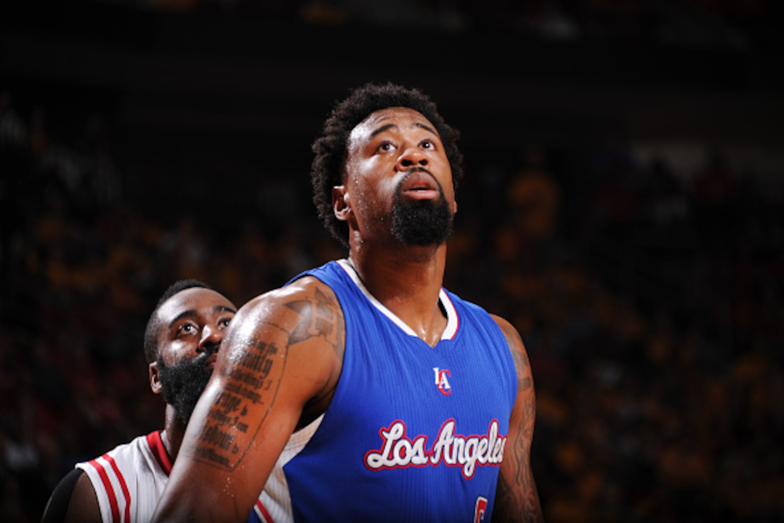 HOUSTON, TX - MAY 12: DeAndre Jordan #6 of the Los Angeles Clippers looks for the rebound against James Harden #13 of the Houston Rockets during Game Five of the Western Conference Semifinals during the NBA Playoffs on May 12, 2015 at Toyota Center in Hou